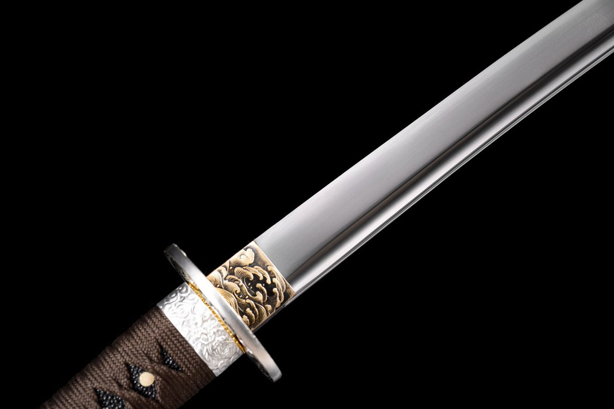 Wave-pattern habaki at the base of the 1045 steel blade