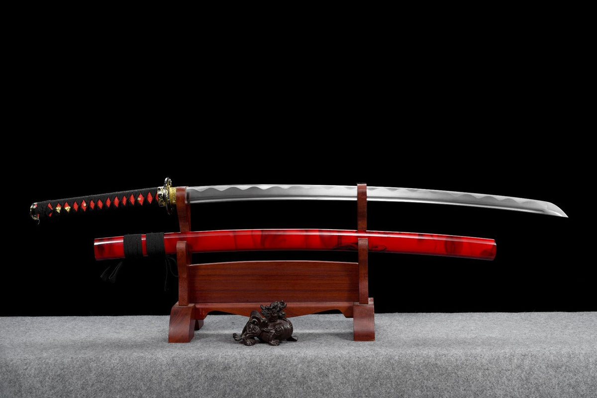 Full view of Under Bamboo katana with polished blade and red-and-black lacquered scabbard