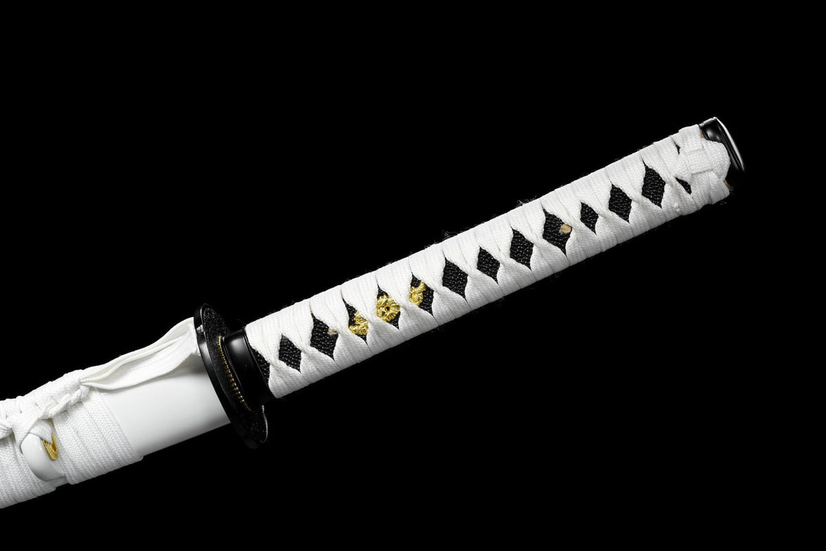 Black pommel over white cord-wrapped handle