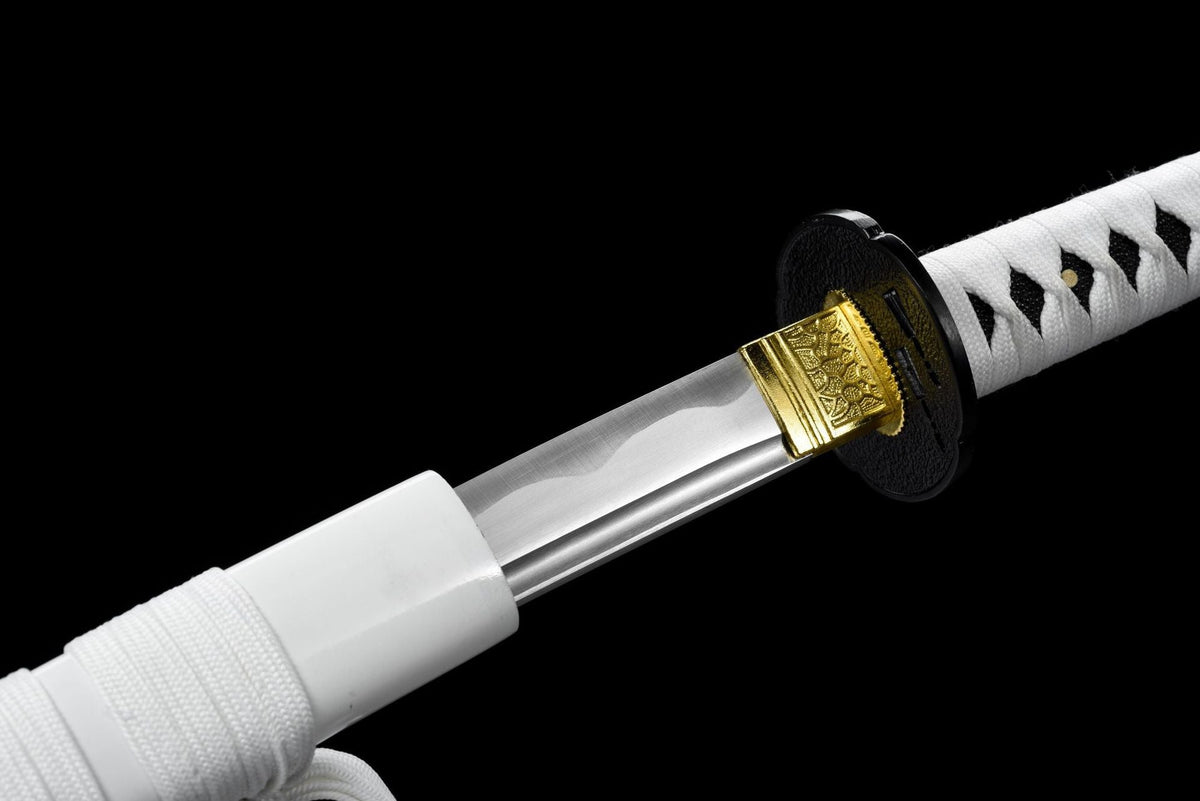 White cord-wrapped handle beside white lacquered wood scabbard