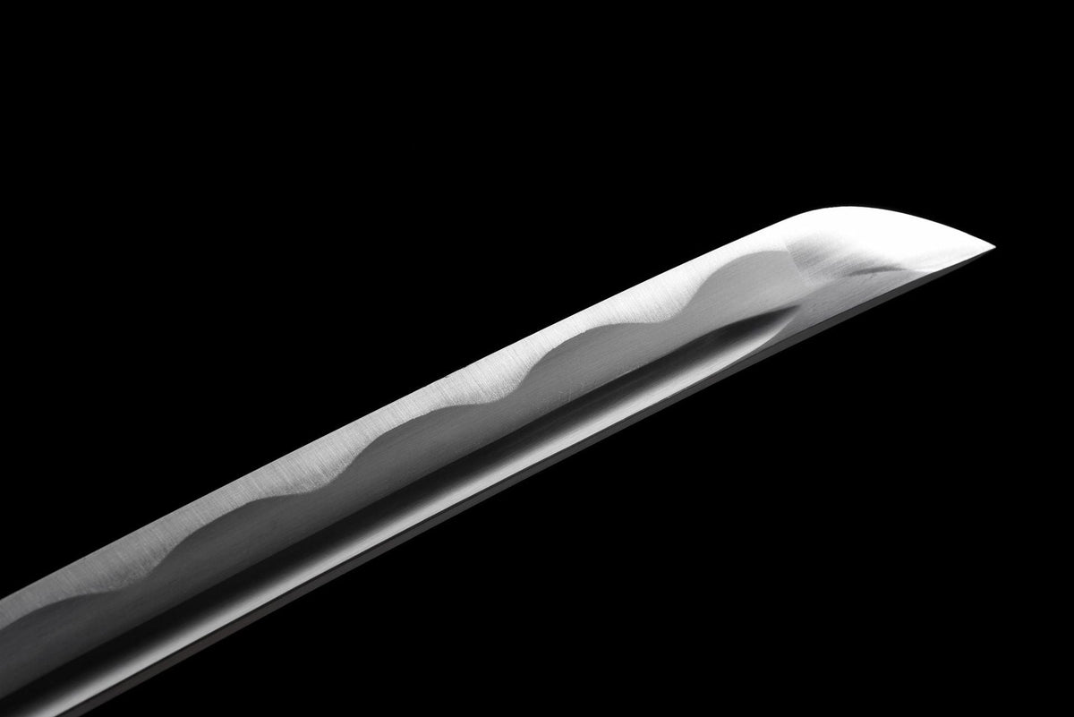 Decorative wave line on the polished steel blade
