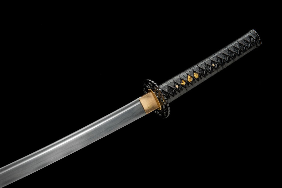 Black tsuka-ito wrap with gold-toned fitting details