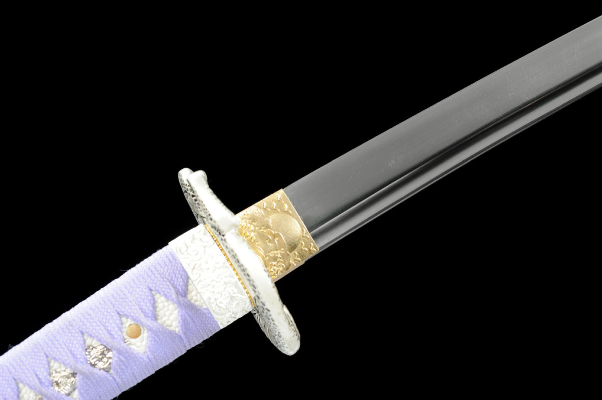 1045 steel blade, patterned habaki, and serpent tsuba at the guard