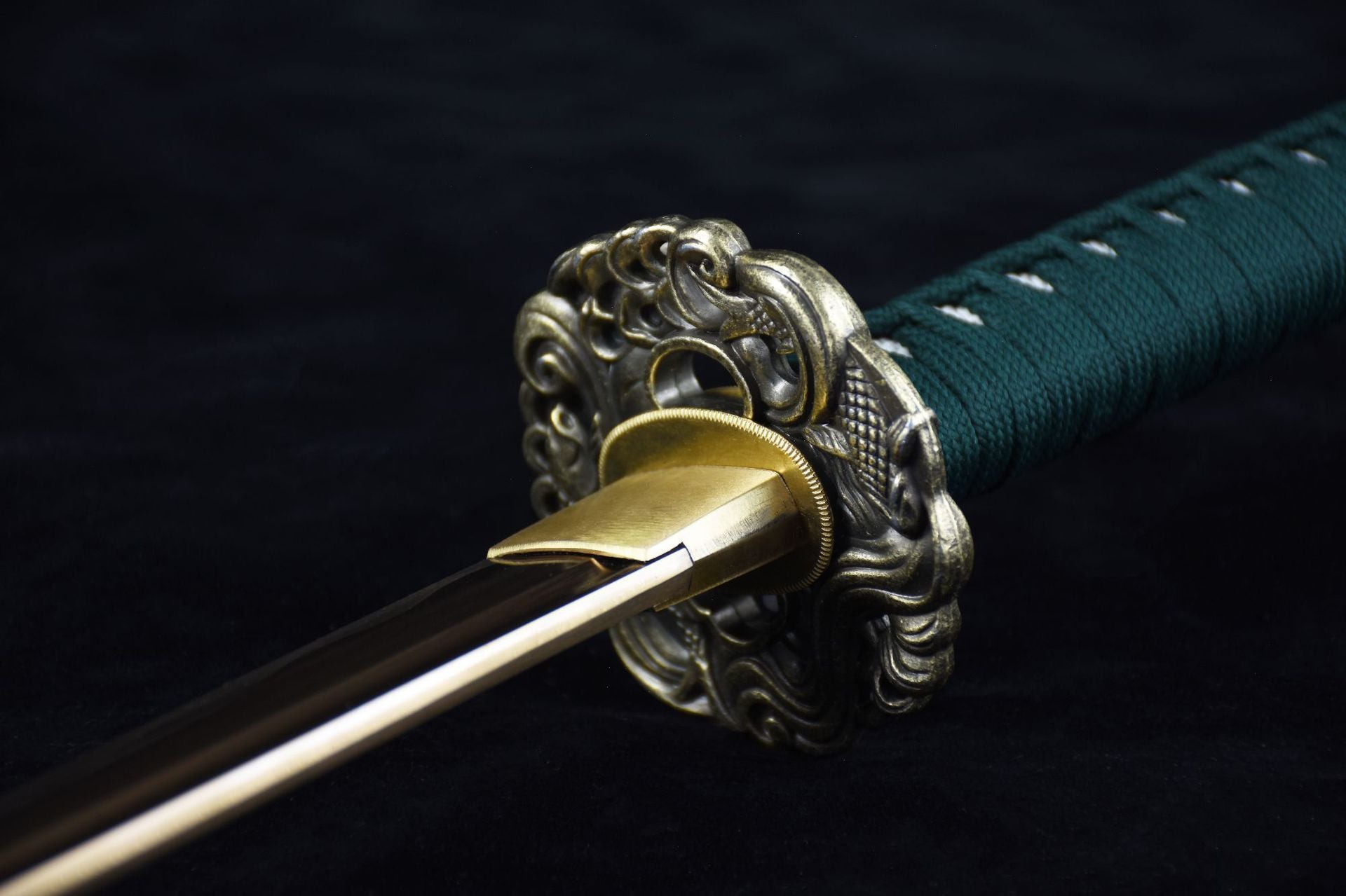 Alloy tsuba of a samurai sword with intricate openwork detailing