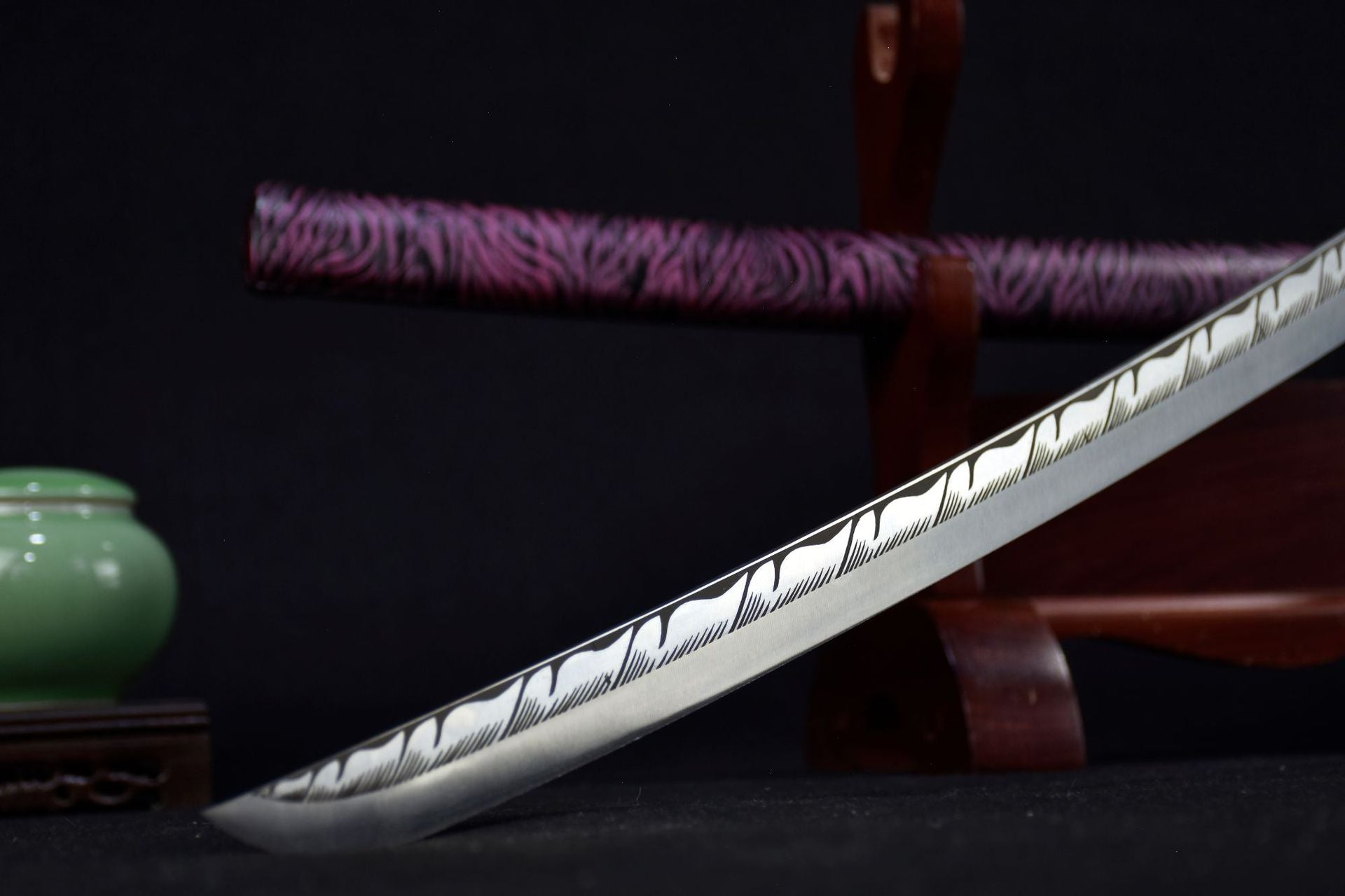 A cool samurai sword blade featuring intricate artwork