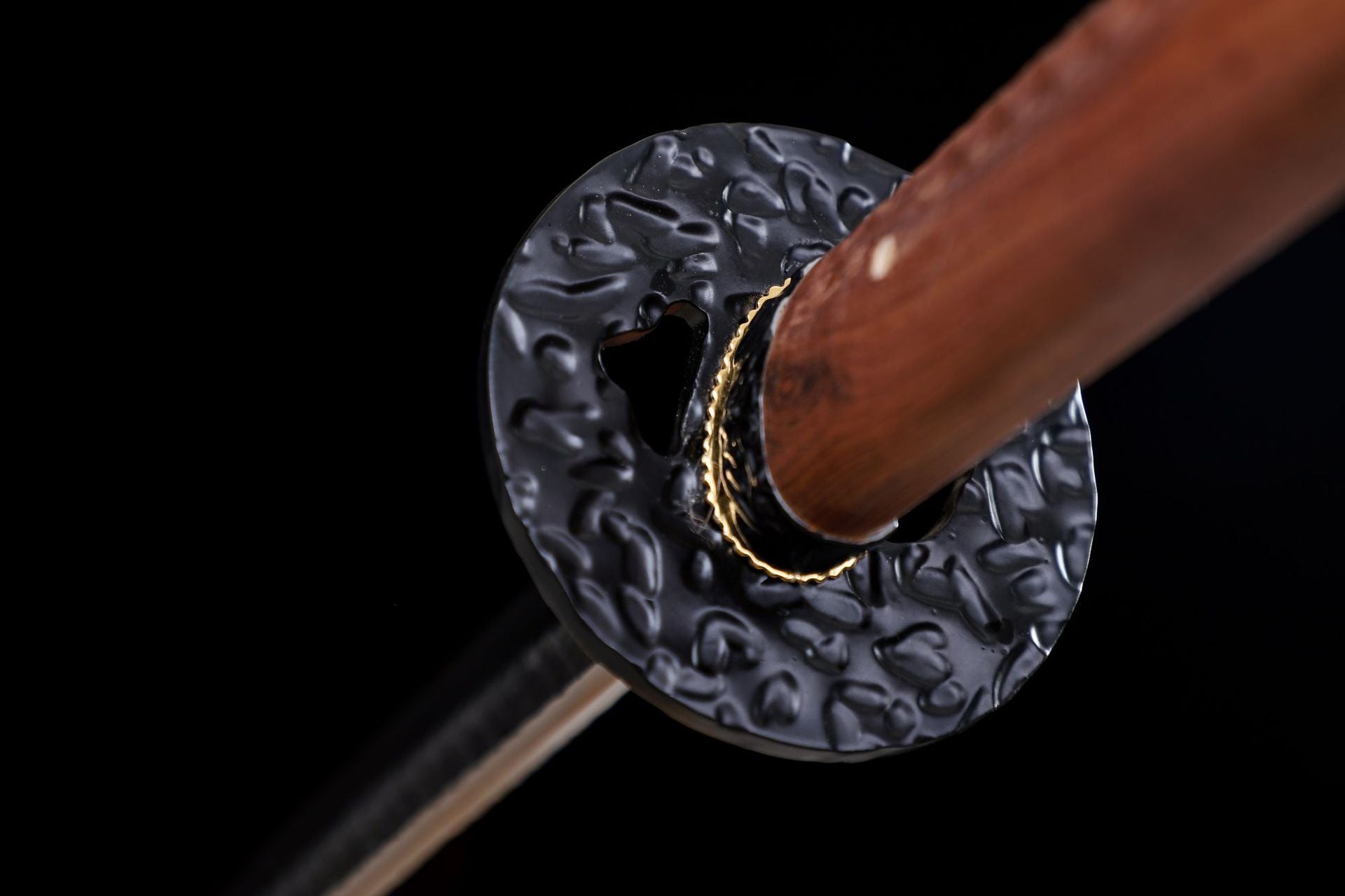 A detailed view of a real samurai sword available for purchase