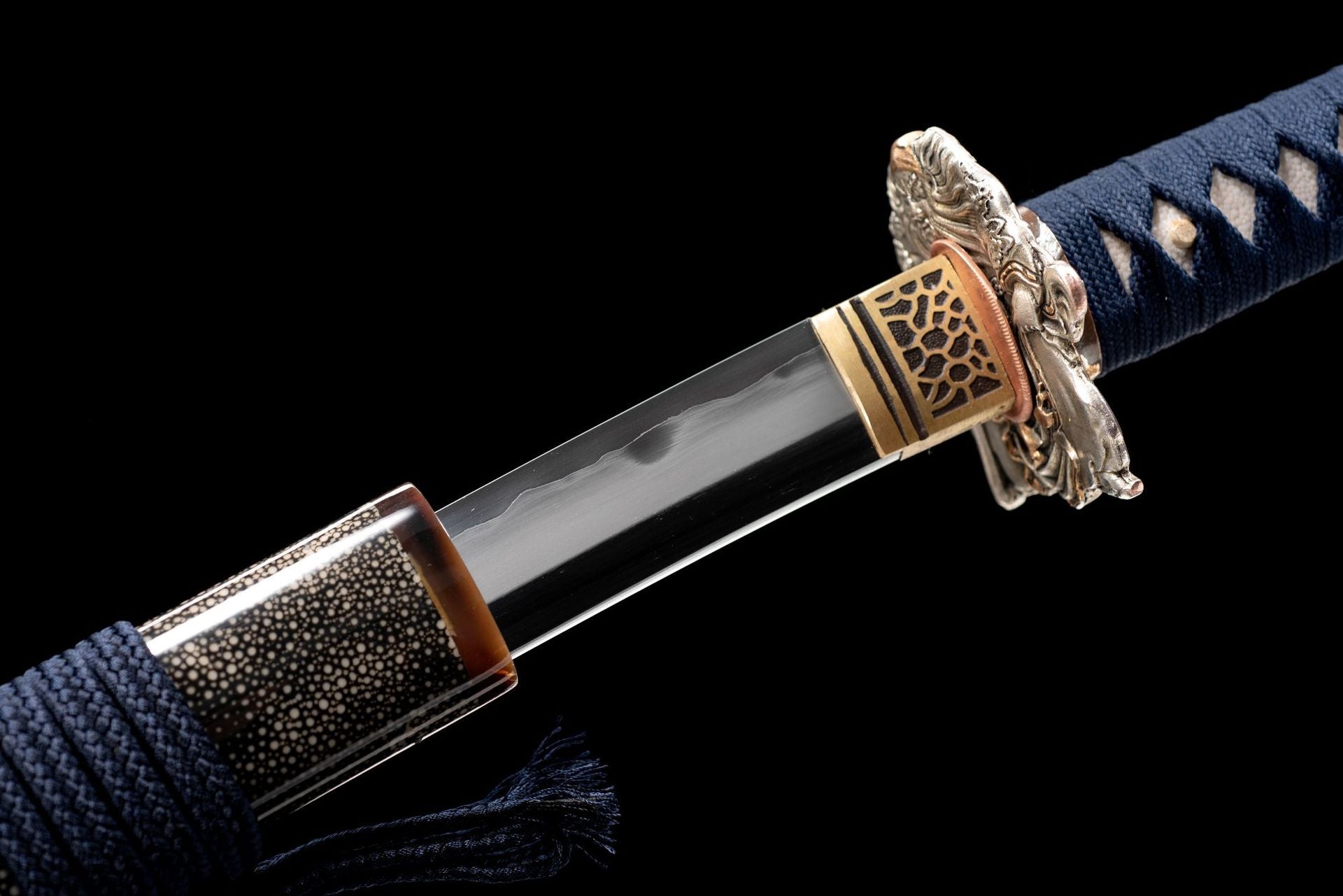 Close-up of the koikuchi and habaki on an Exorcism katana.