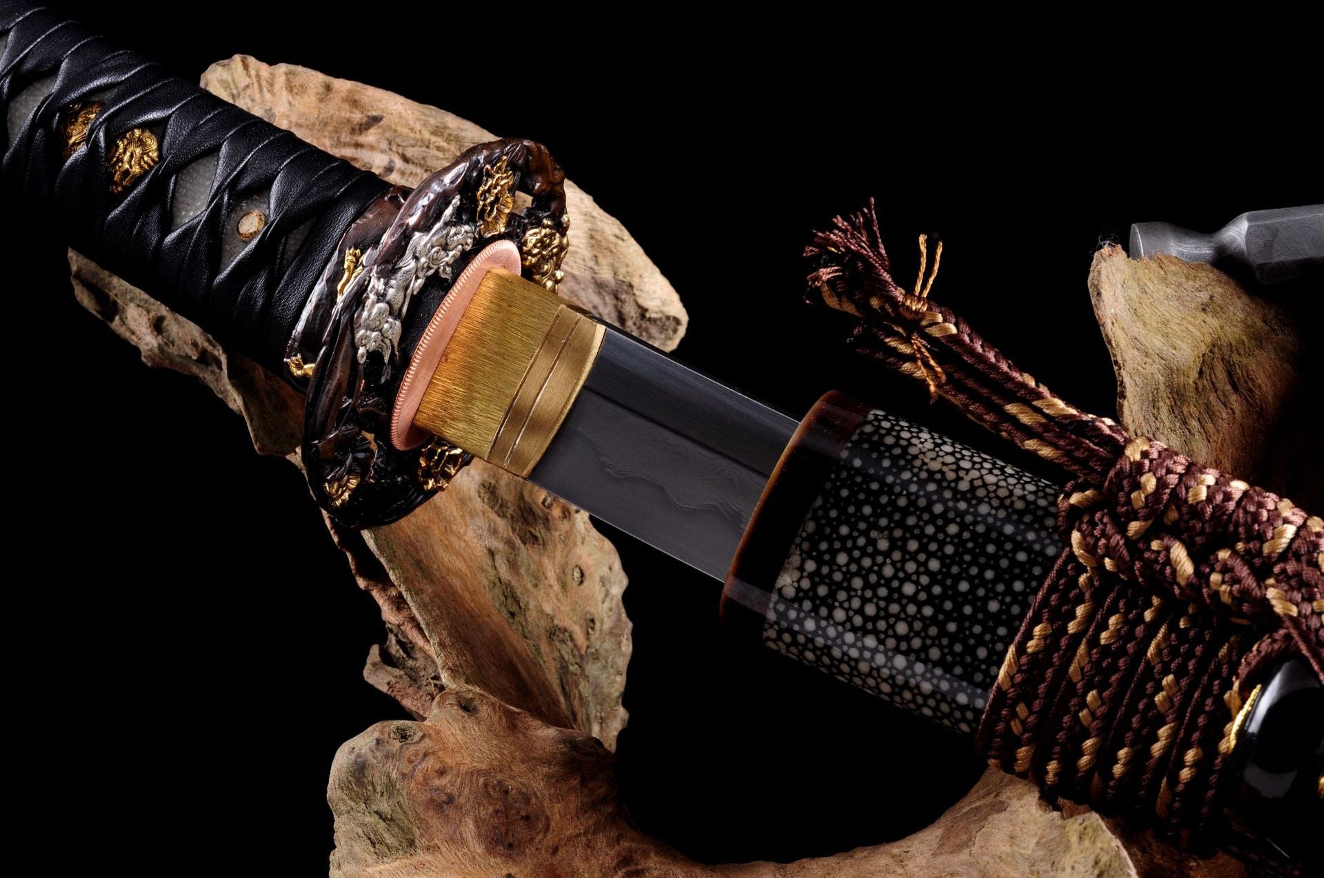 Genji katana habaki and koikuchi ensuring secure blade retention in the scabbard.