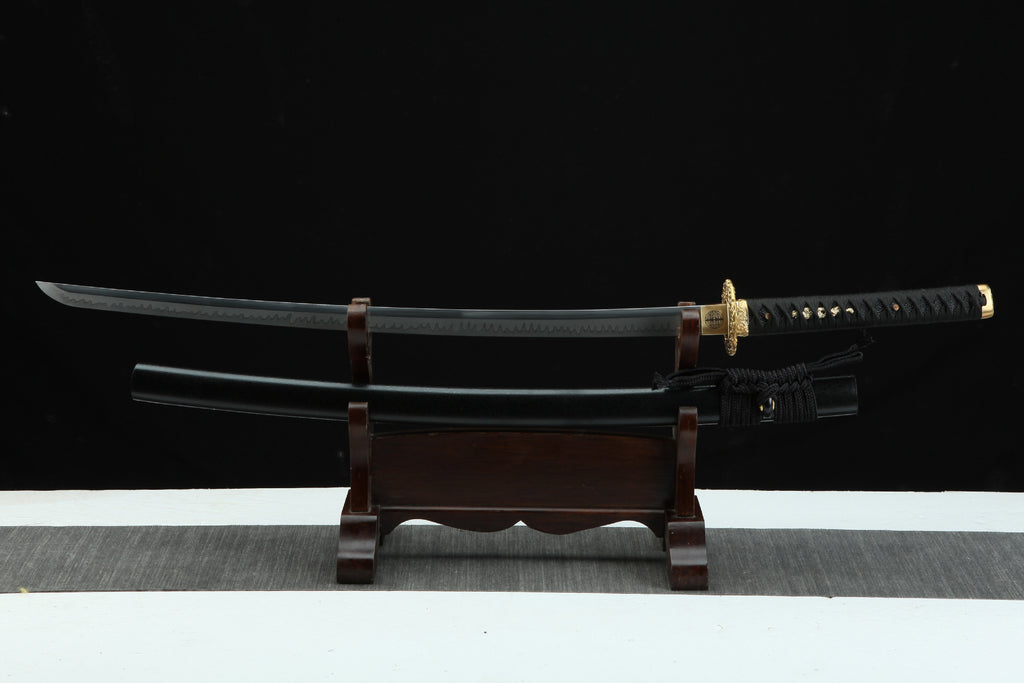Golden Loong samurai sword with golden guard and black sheath on a wooden stand.