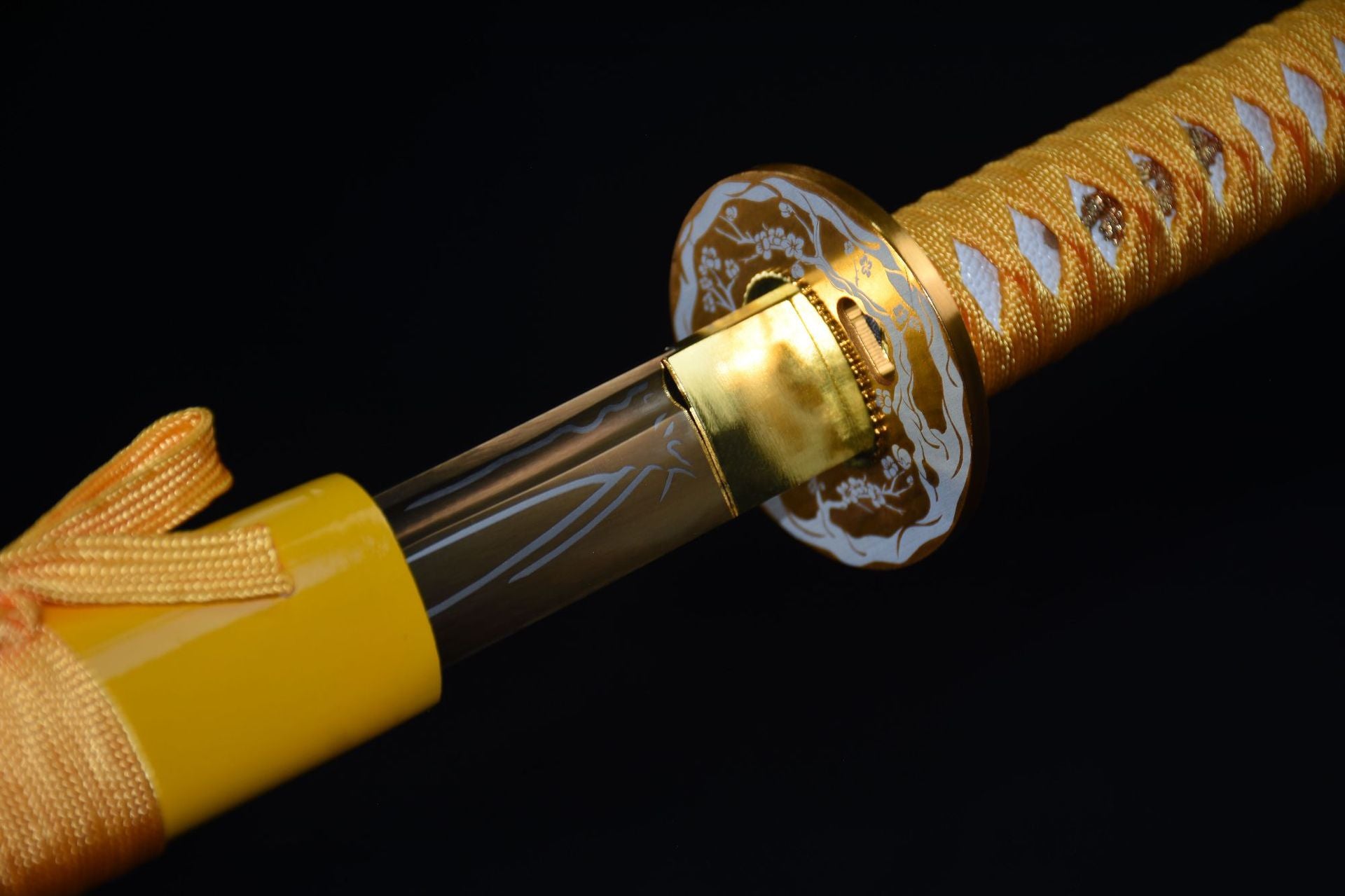 A golden sakura samurai sword slightly drawn from its scabbard