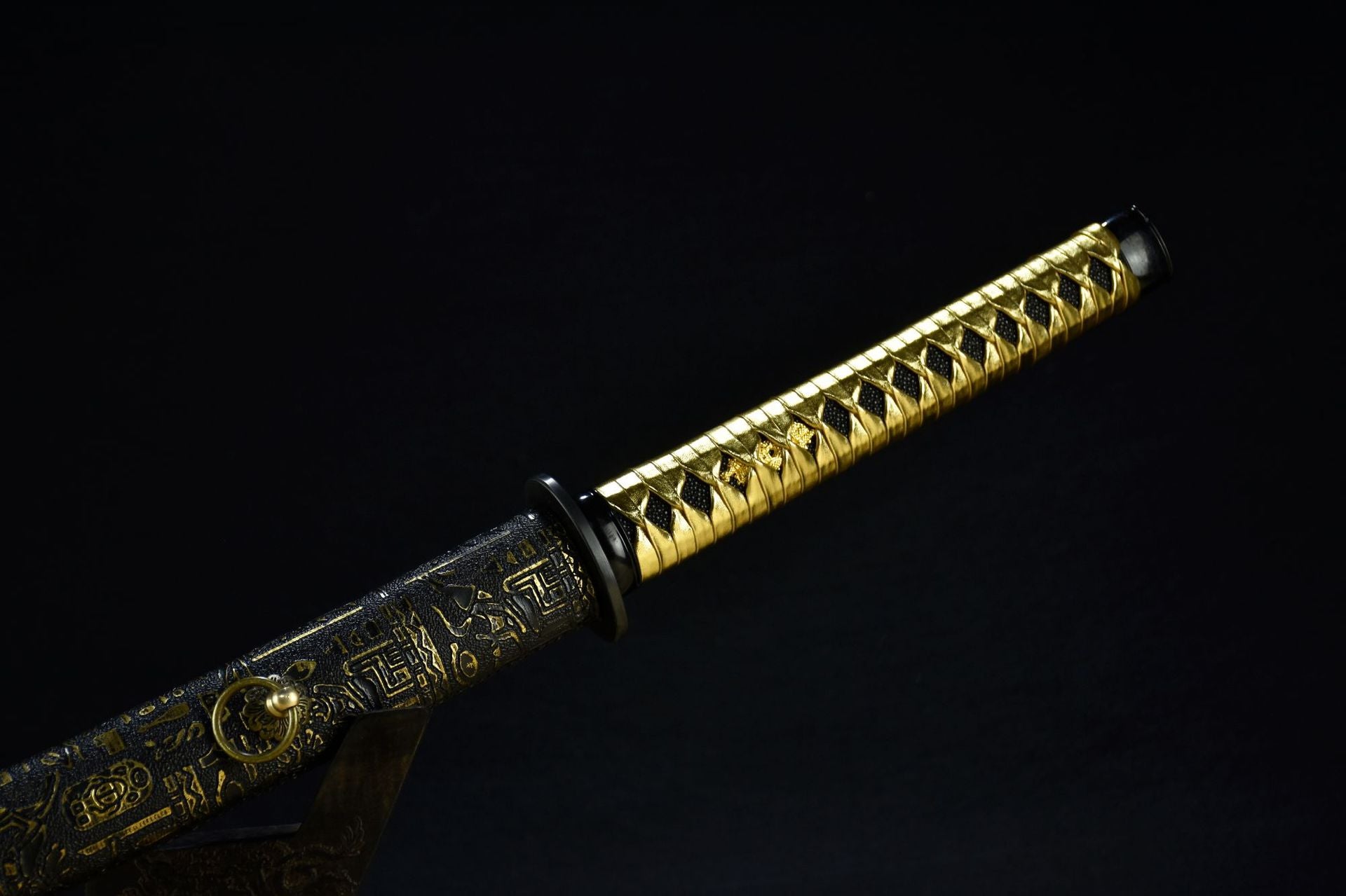 A golden Samurai sword handle.