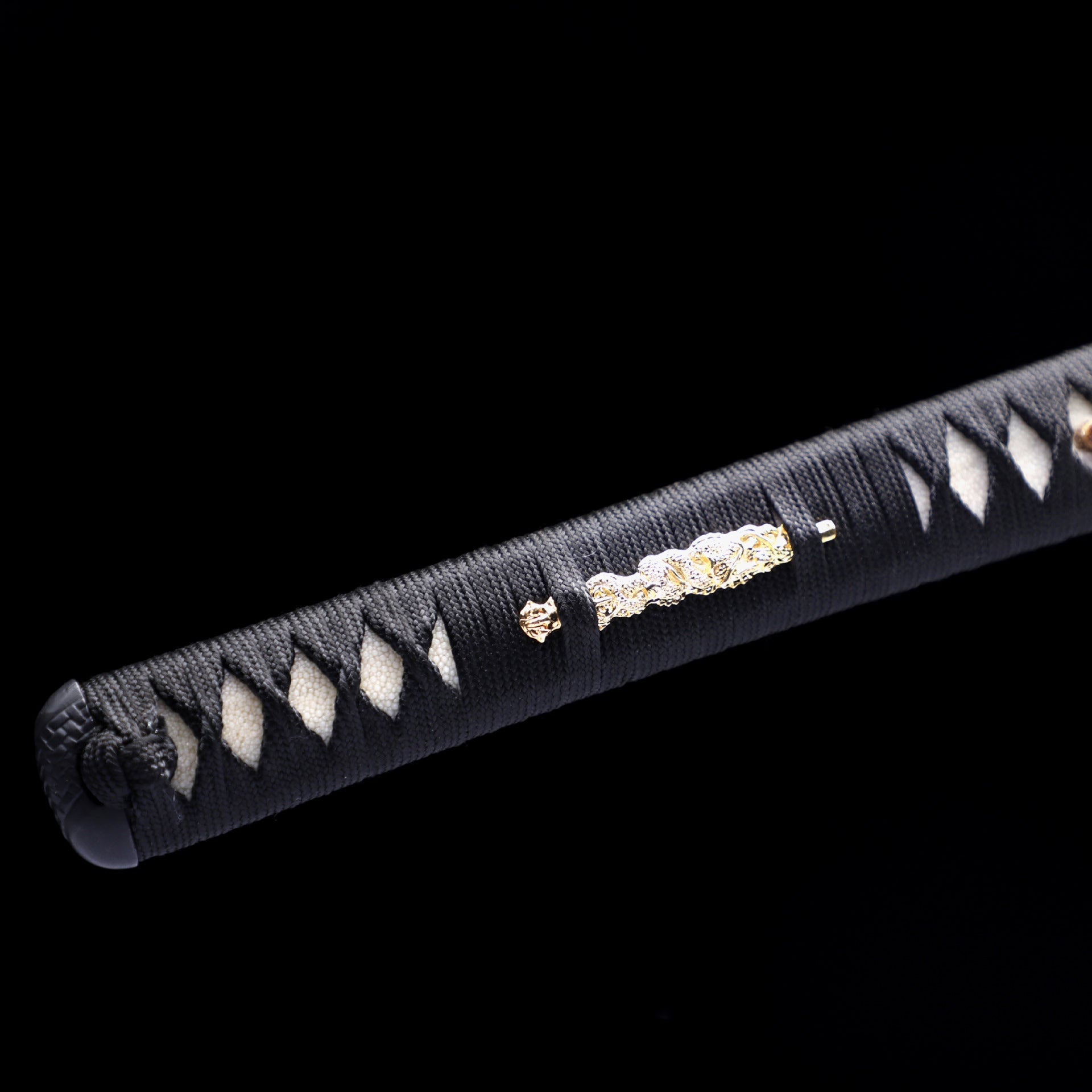 Detailed view of the tsuka (handle) of the Guardian katana.