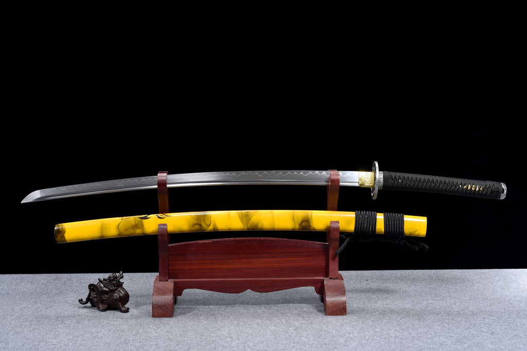A hand-forged carbon steel katana, showcasing the craftsmanship and precision in the blade’s creation.
