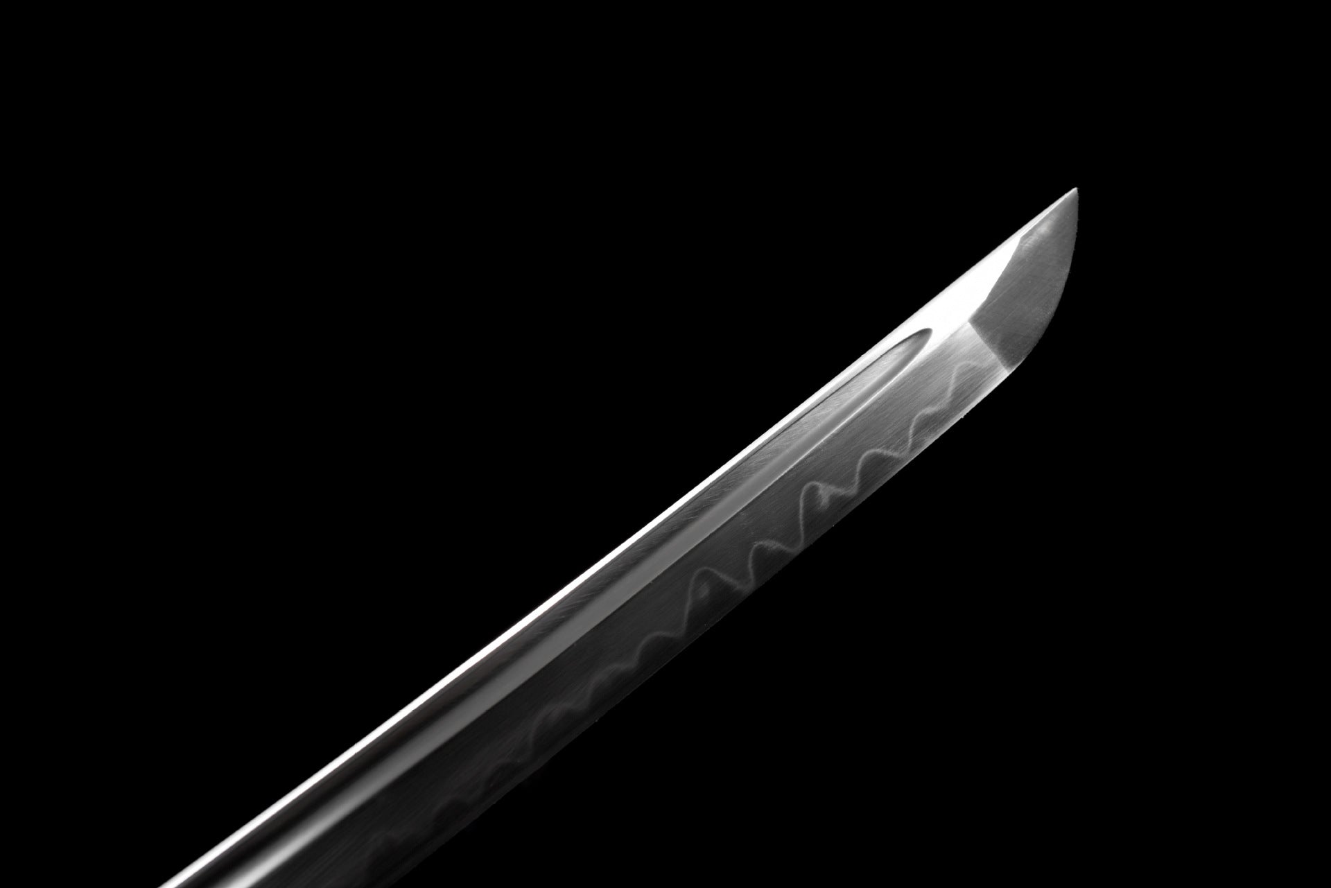 Close-up of the high-quality carbon steel blade, showcasing its sharpness and craftsmanship, typical of a true katana.