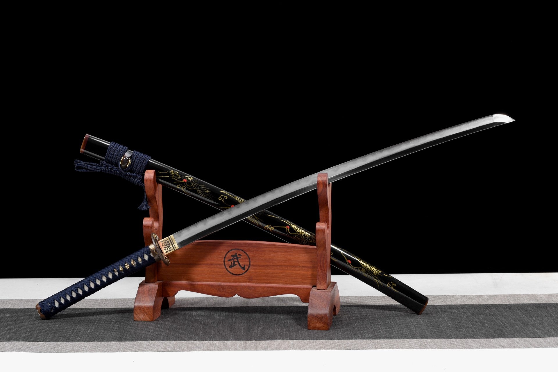 Immortal Crane katana forged from damascus steel with a kobuse construction.