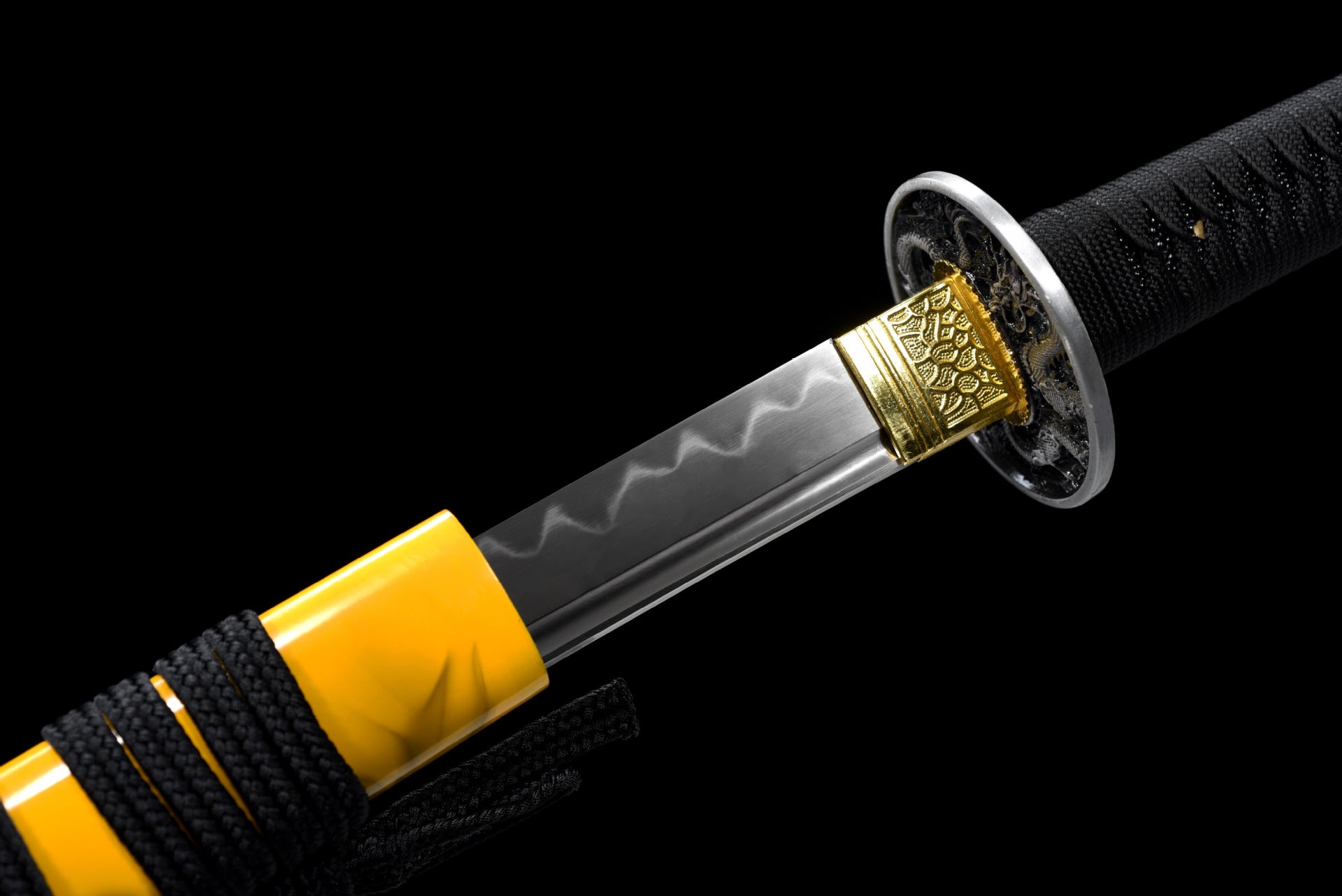 The "Mythical Loong" katana being drawn from its saya, showcasing the elegant flow of the blade and the intricate design.
