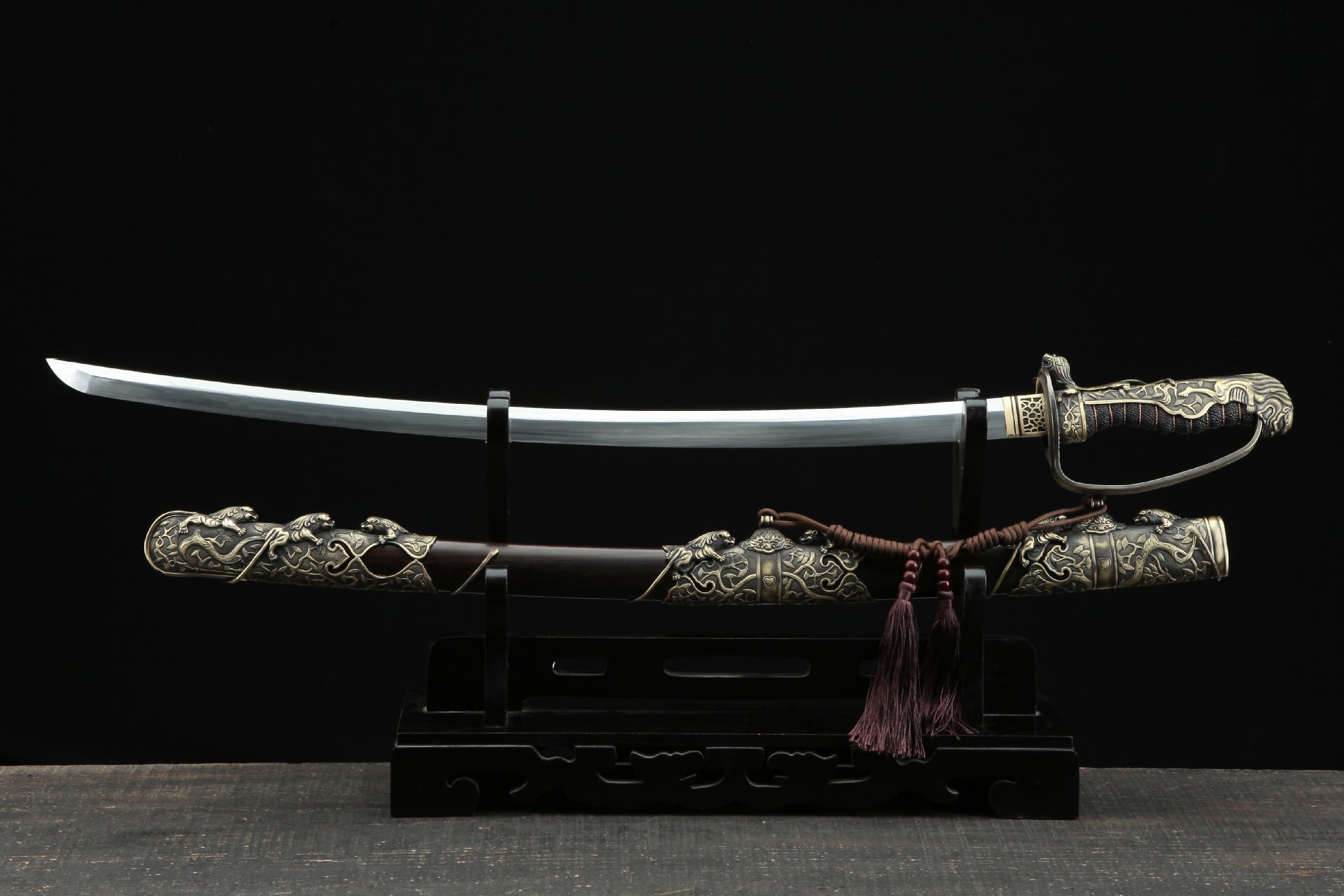 Nine Lions Damascus steel military sword with ornate fittings.