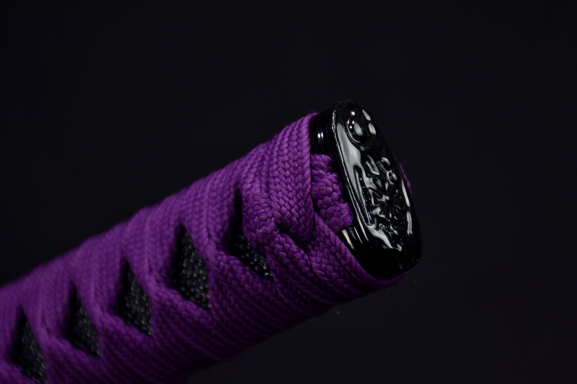 A purple katana sword handle