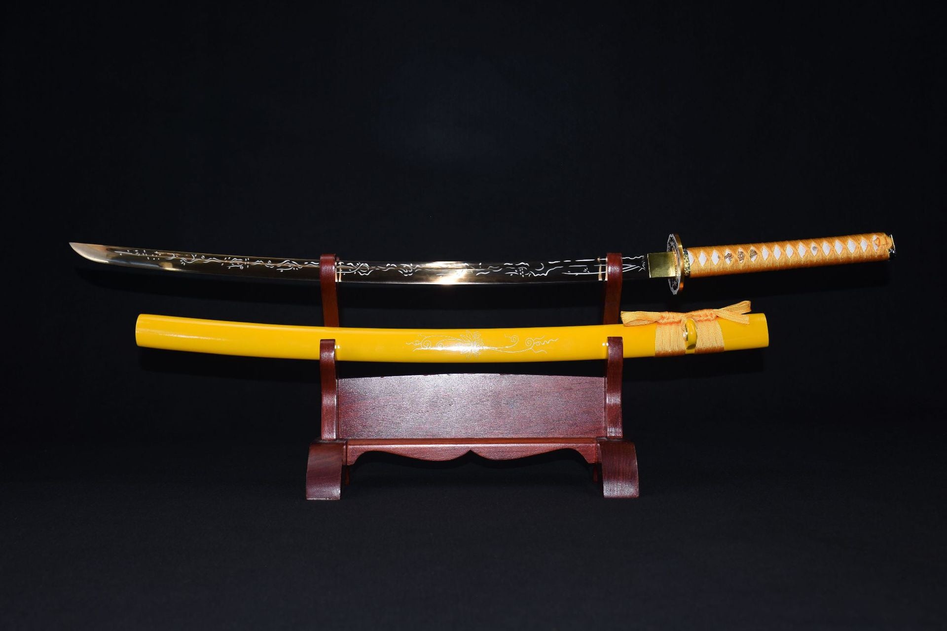 A real gold katana with a yellow scabbard