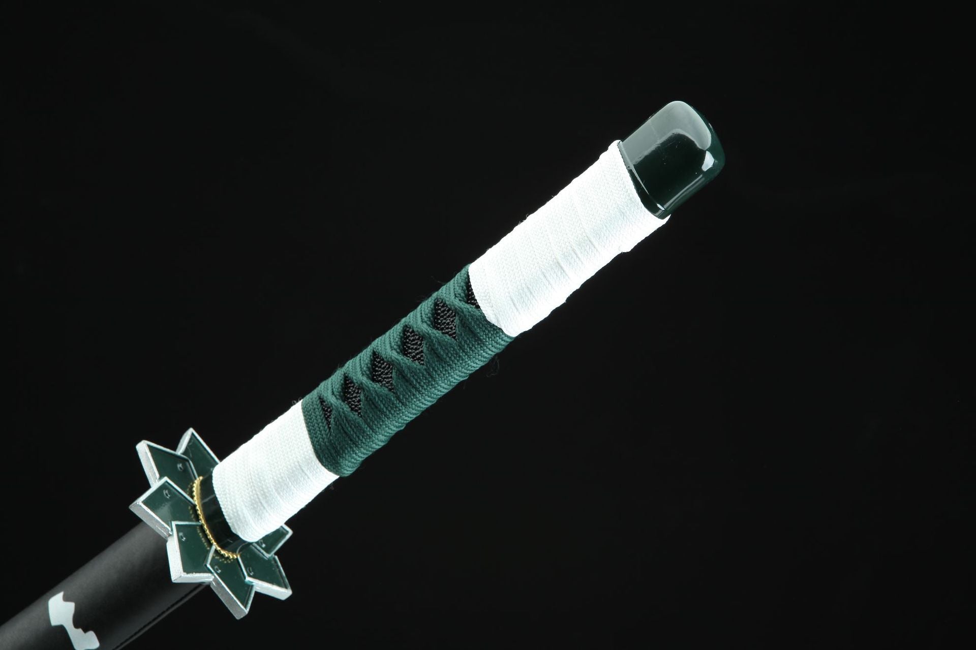 Sanemi Sword's handle showcasing a black handle wrapped with white cord at both ends and green cord in the middle.