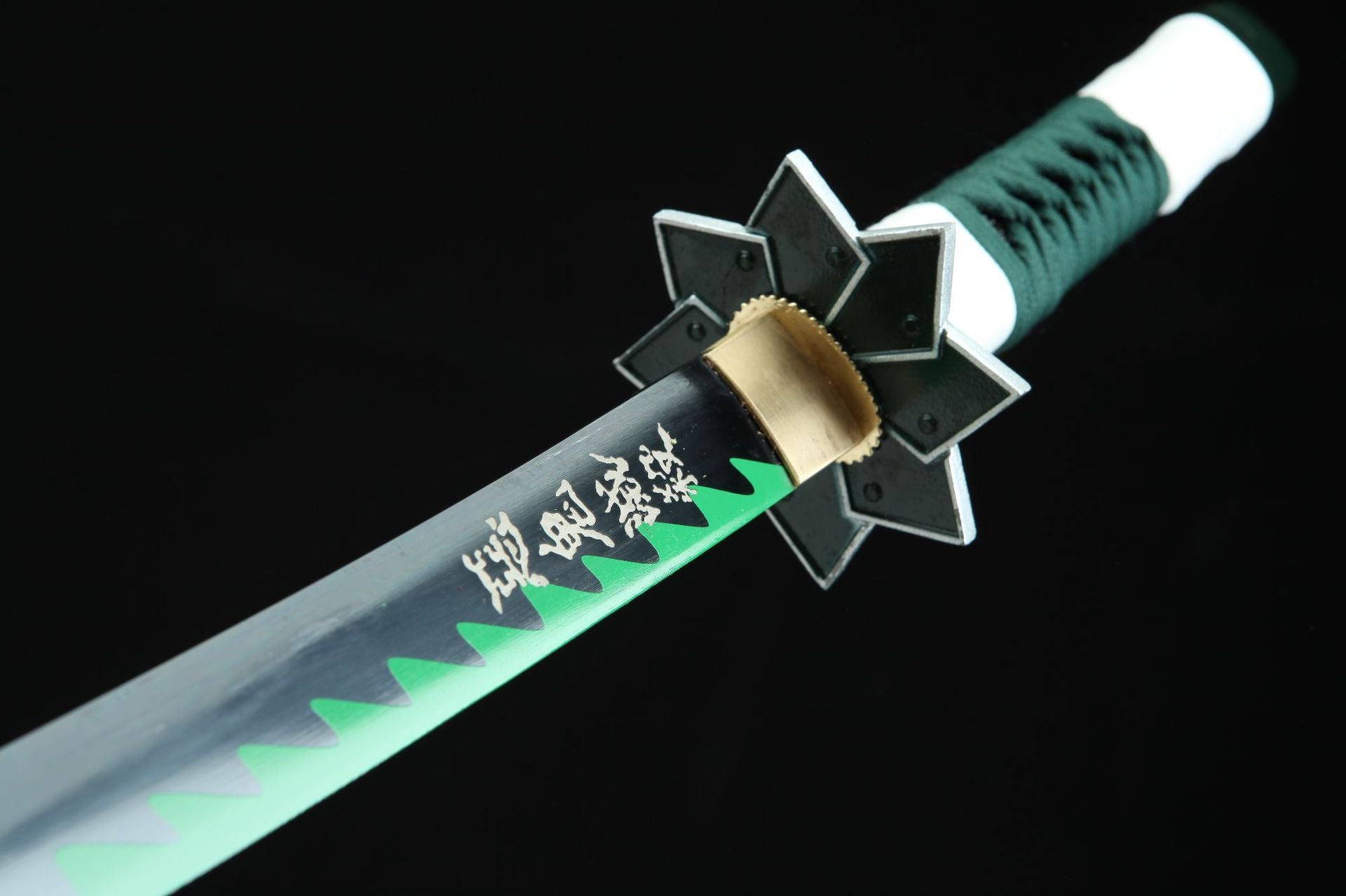 A detailed view of Sanemi's sword, featuring the tsuba and blade, which is engraved with the words "Destroyer of Demons" (惡鬼滅殺).