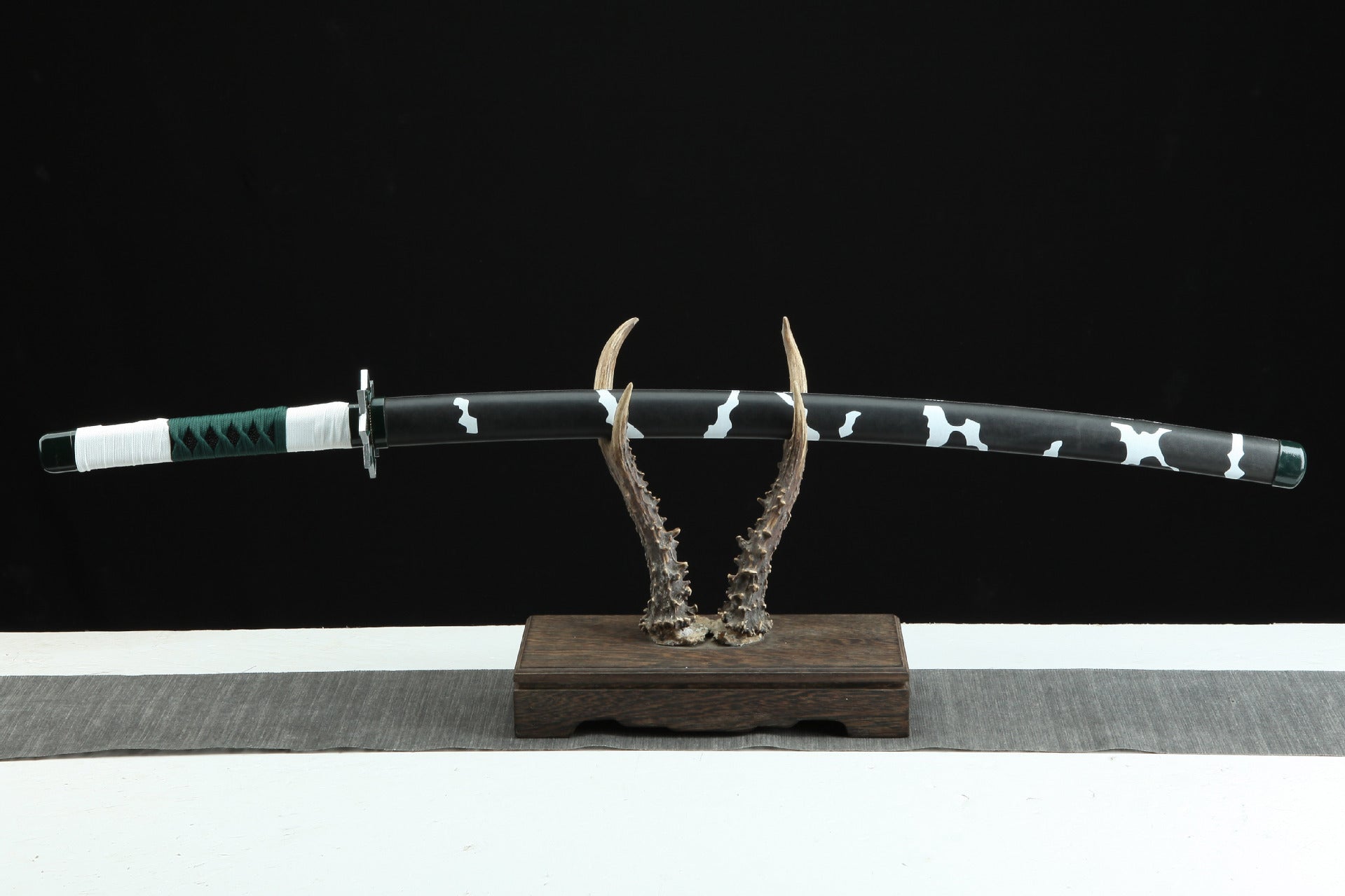 Sanemi’s Nichirin sword sheathed, highlighting its distinctive design from Demon Slayer.