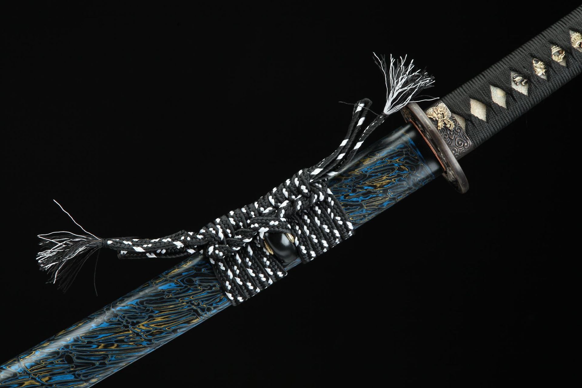 Close-up of Seiryu Samurai sword sageo and tsuka with black cord wrapping.