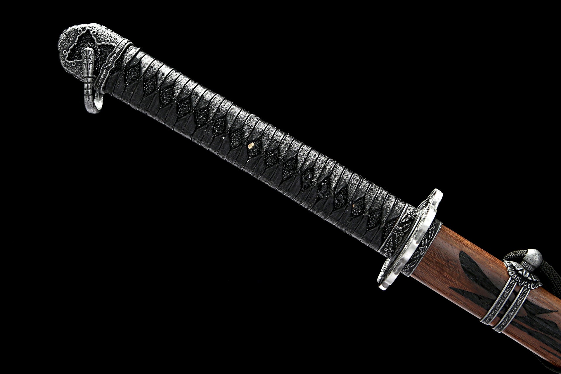 Close-up of Sekiro Mortal Blade handle with intricate black cord wrapping and decorative guard, showcasing the craftsmanship.