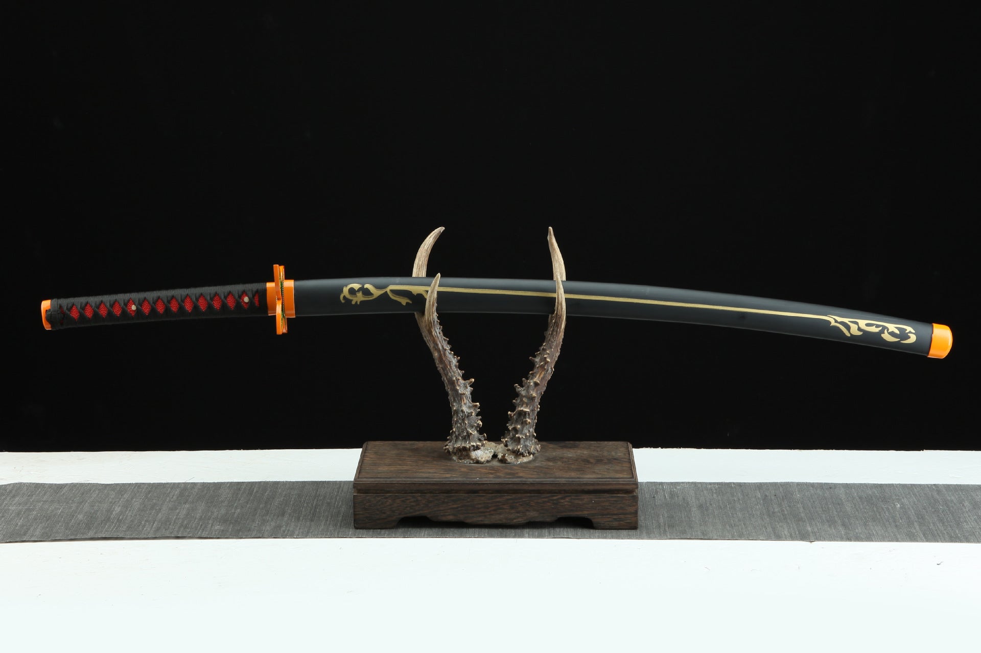 Shinobu Kocho's Nichirin sword sheathed, highlighting the butterfly-themed design from Demon Slayer.