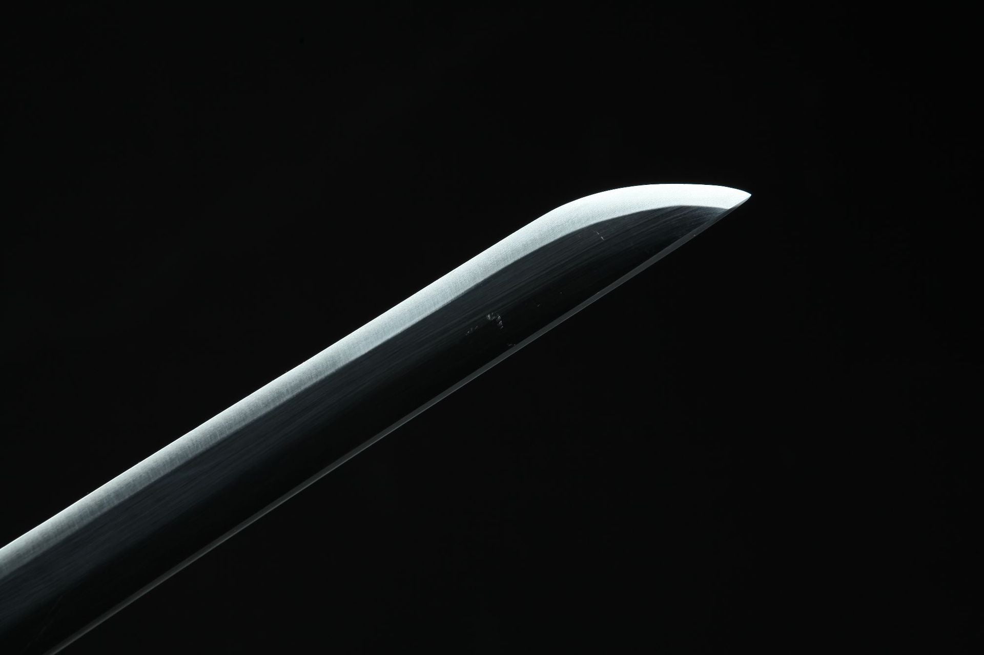 Close-up of Shinobu's Nichirin sword tip from Demon Slayer.