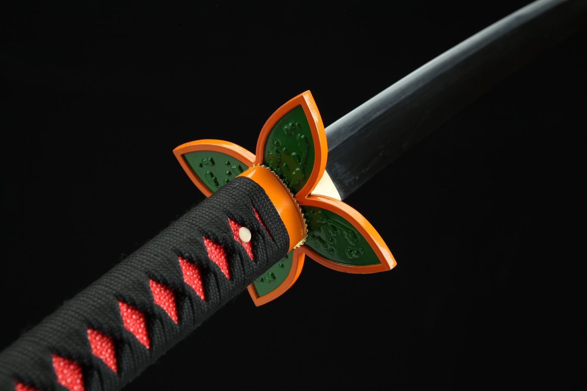 Shinobu sword guard (tsuba) and handle (tsuka) from Demon Slayer.