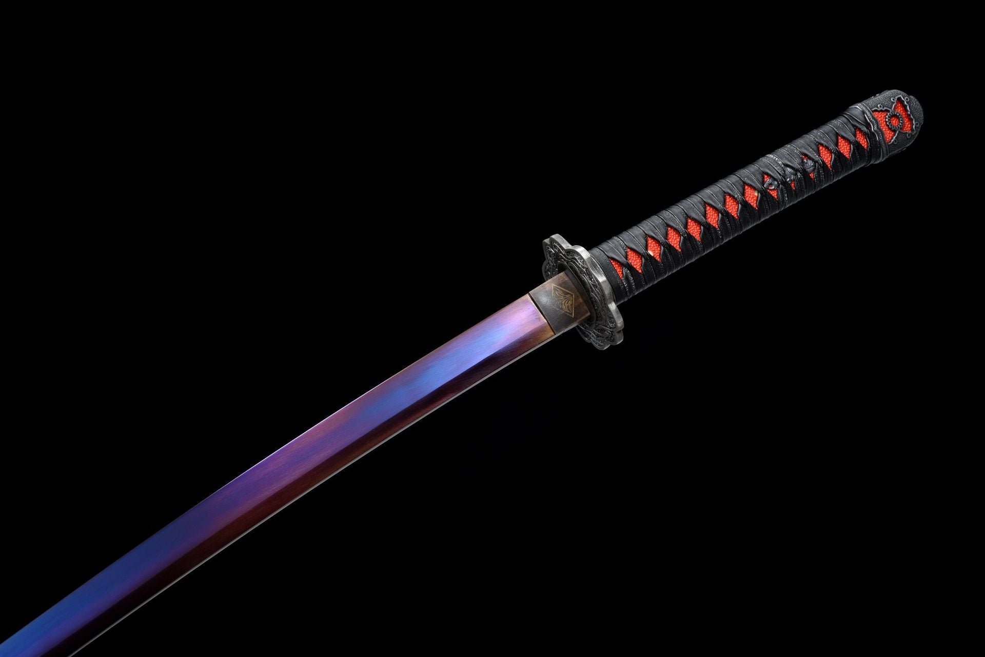 Side view of the Mortal Blade, showing the red blade and handle.
