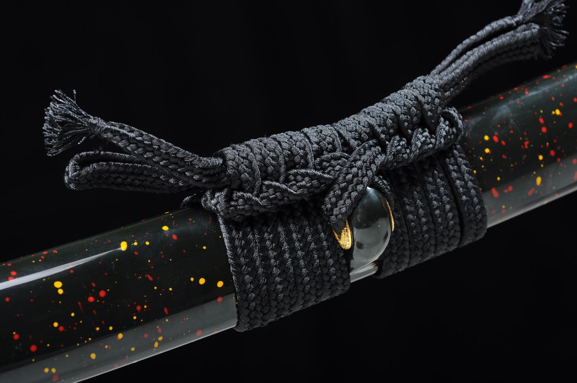 Handwoven black sageo on the Yuuzumi katana.