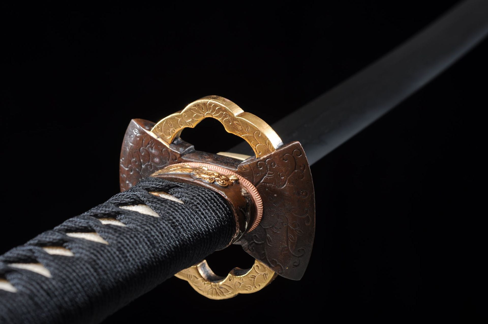 Traditional patterned tsuba of the Yuuzumi katana.