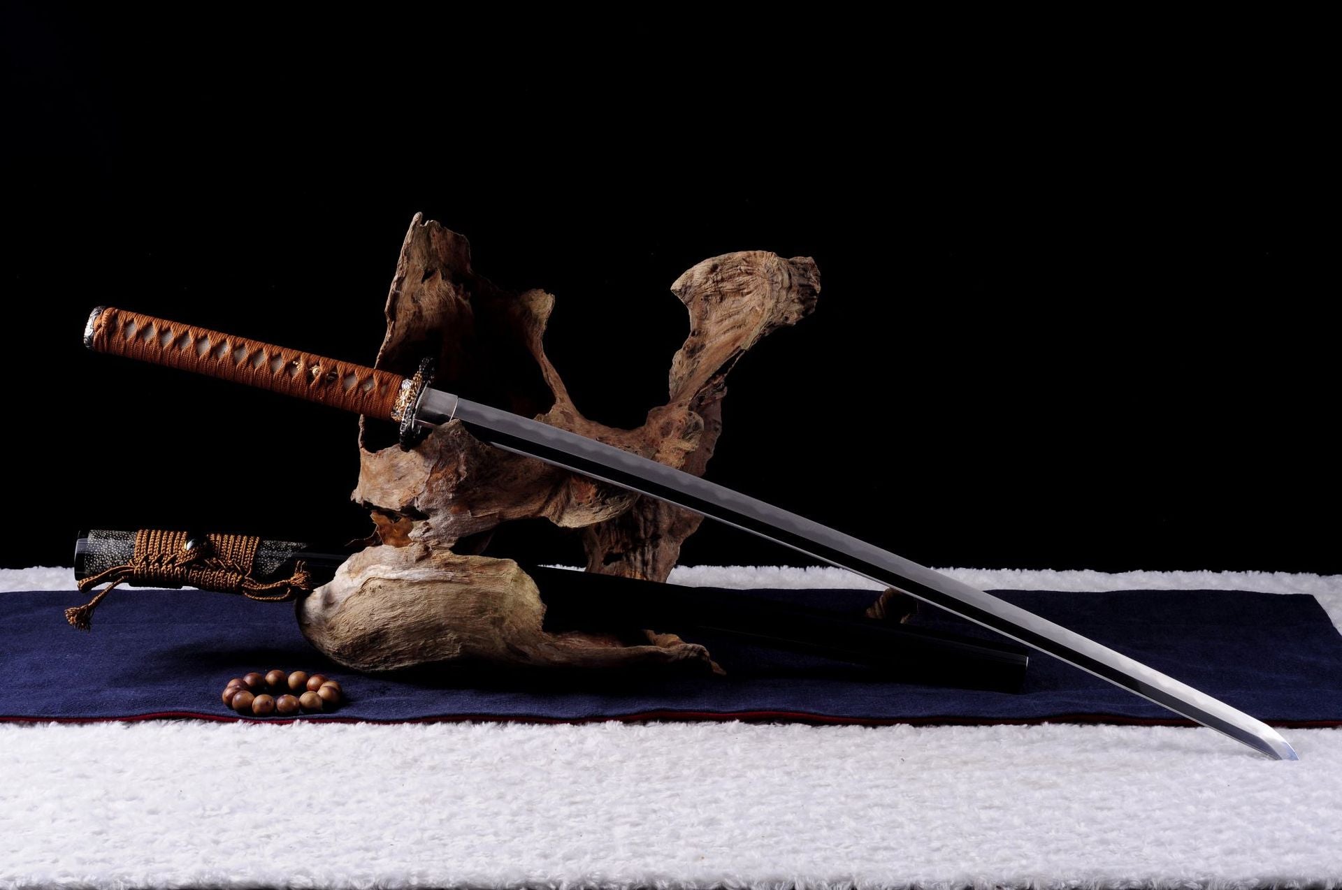 Traditional Daisy carbon steel katana for martial arts and display.