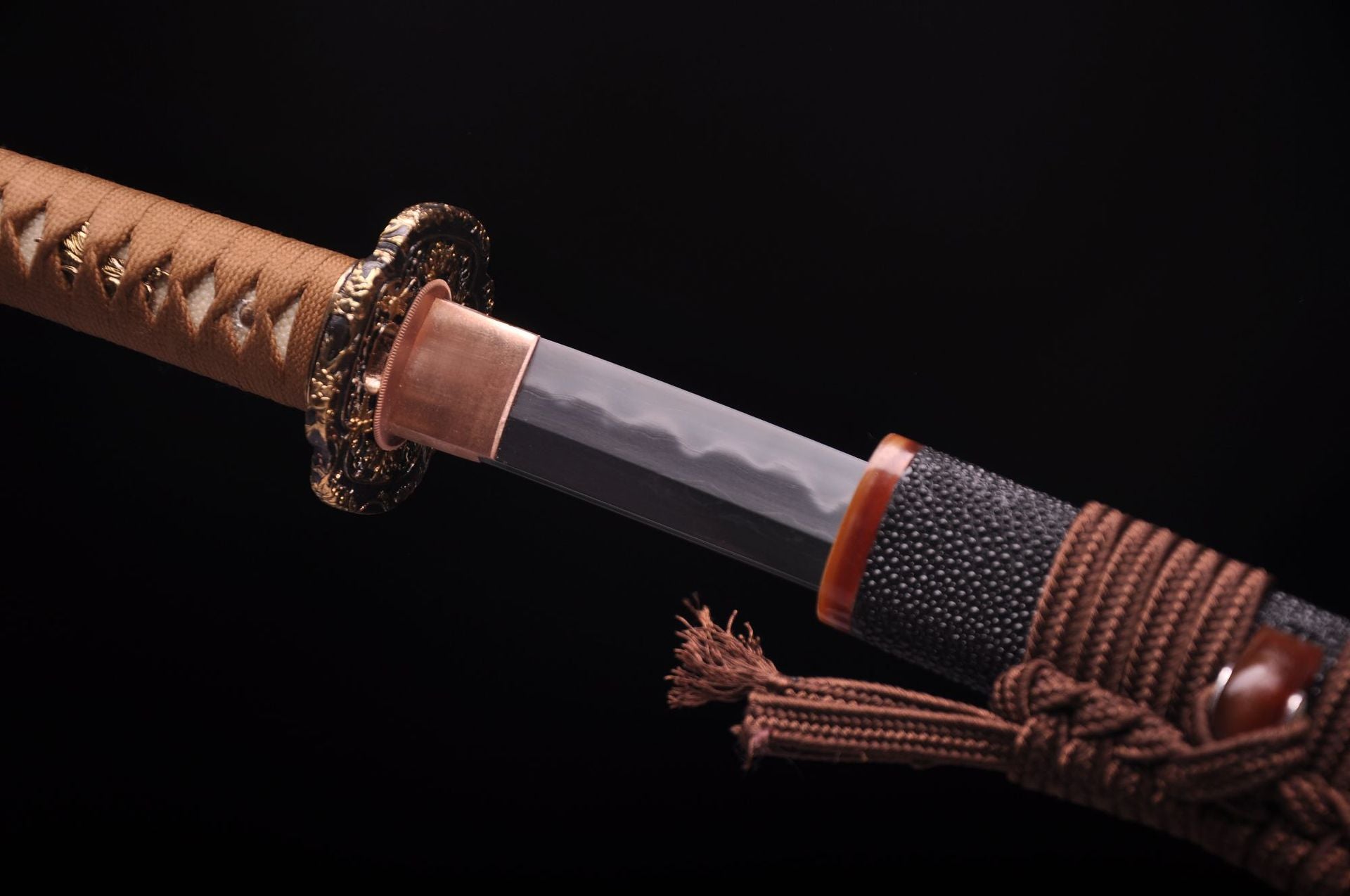 Brass habaki and koiguchi of the katana.