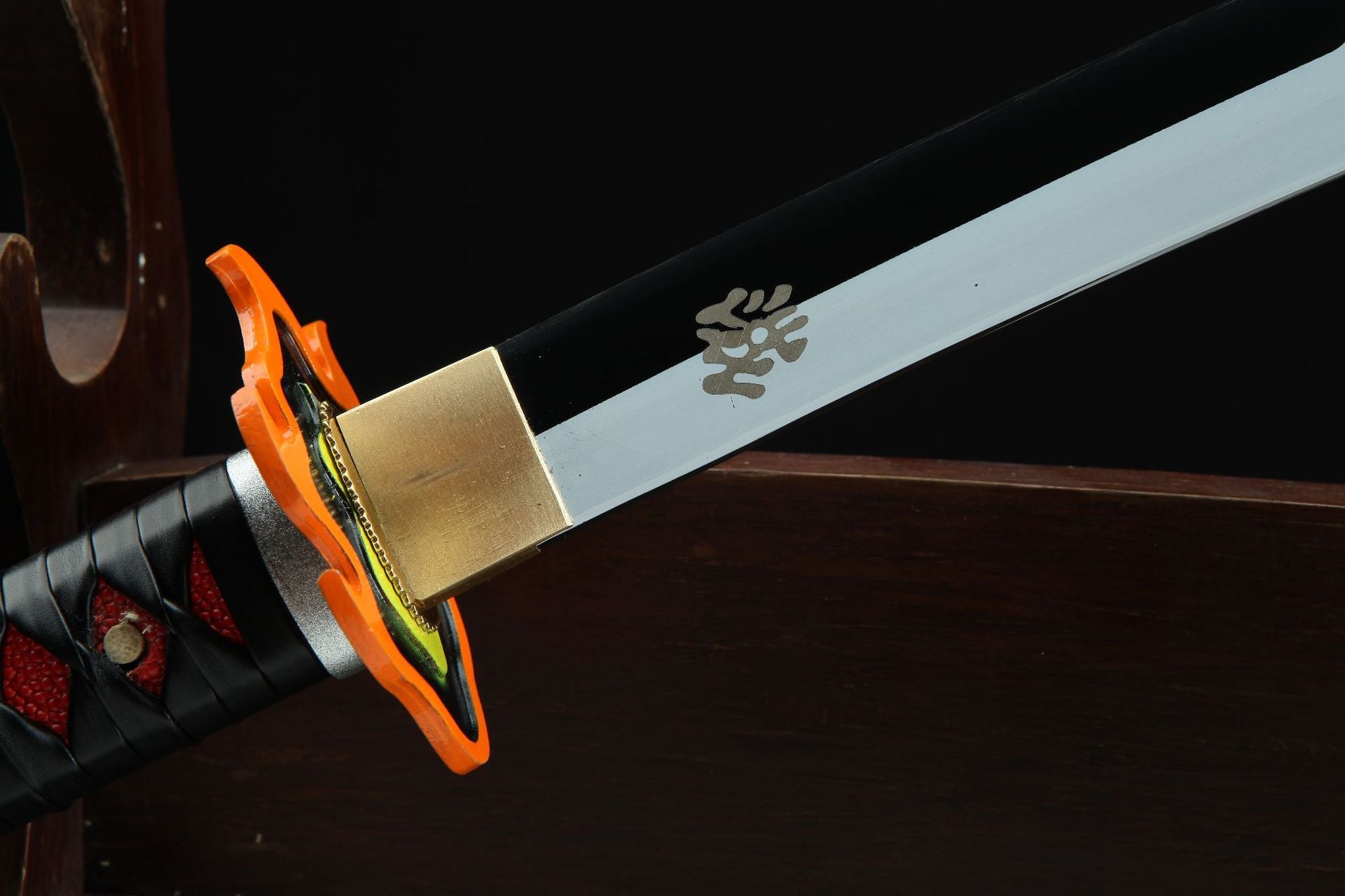 A close-up of the side profile of Tanjiro's Nichirin Sword's tsuba