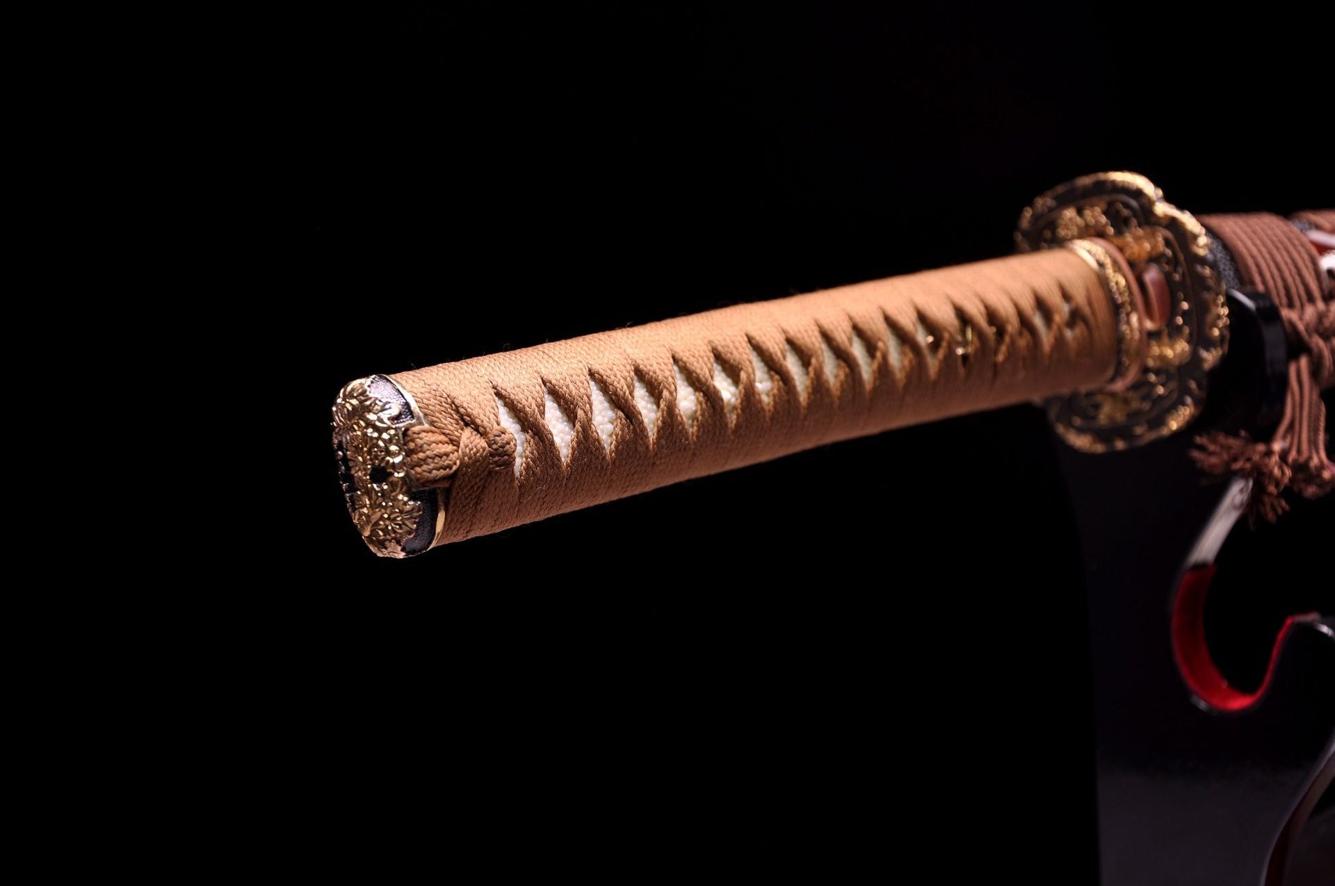 Exquisitely gilded katana pommel.