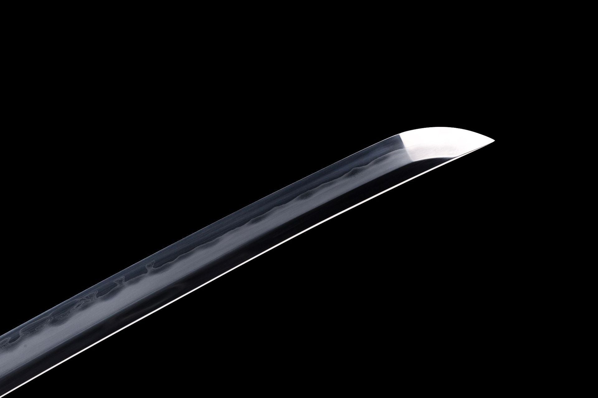 Close-up of a Meditation katana blade showcasing the san-mai forging technique.