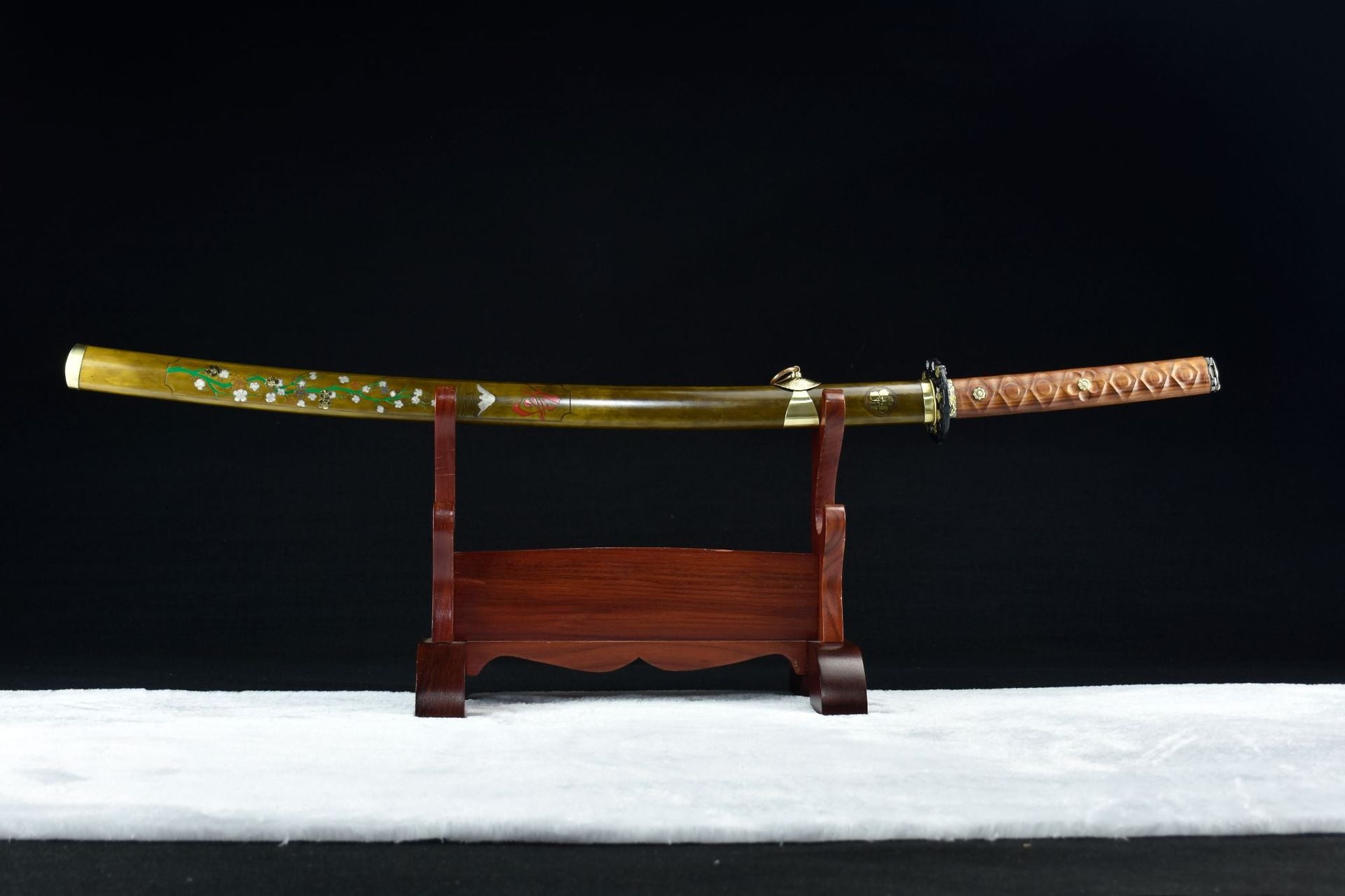Moonlit Sakura samurai sword full koshirae on display, showcasing the intricately designed saya with sakura under moonlight.