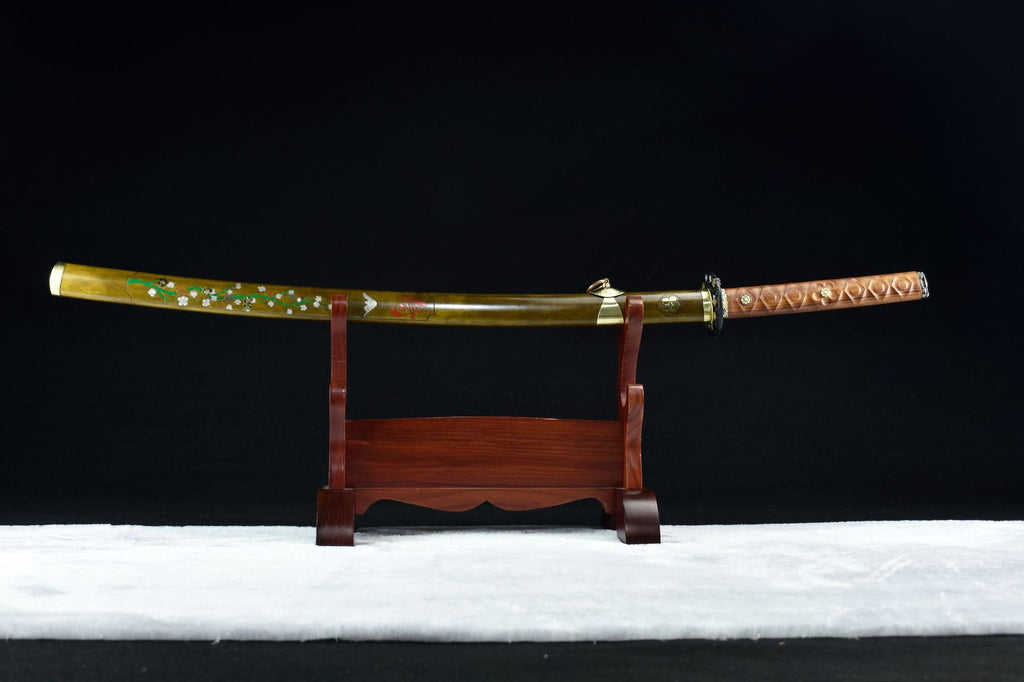 Moonlit Sakura samurai sword full koshirae on display, showcasing the intricately designed saya with sakura under moonlight.