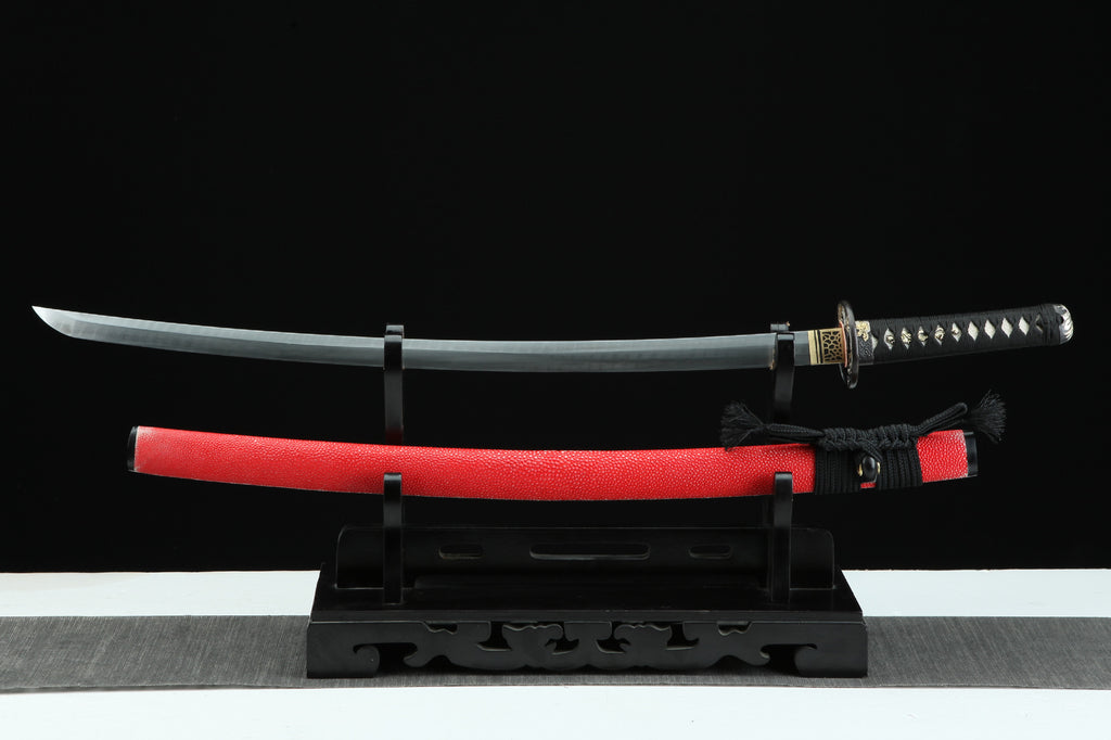 Sakura Ryu damascus steel katana featuring a striking red scabbard (saya) and full koshirae.