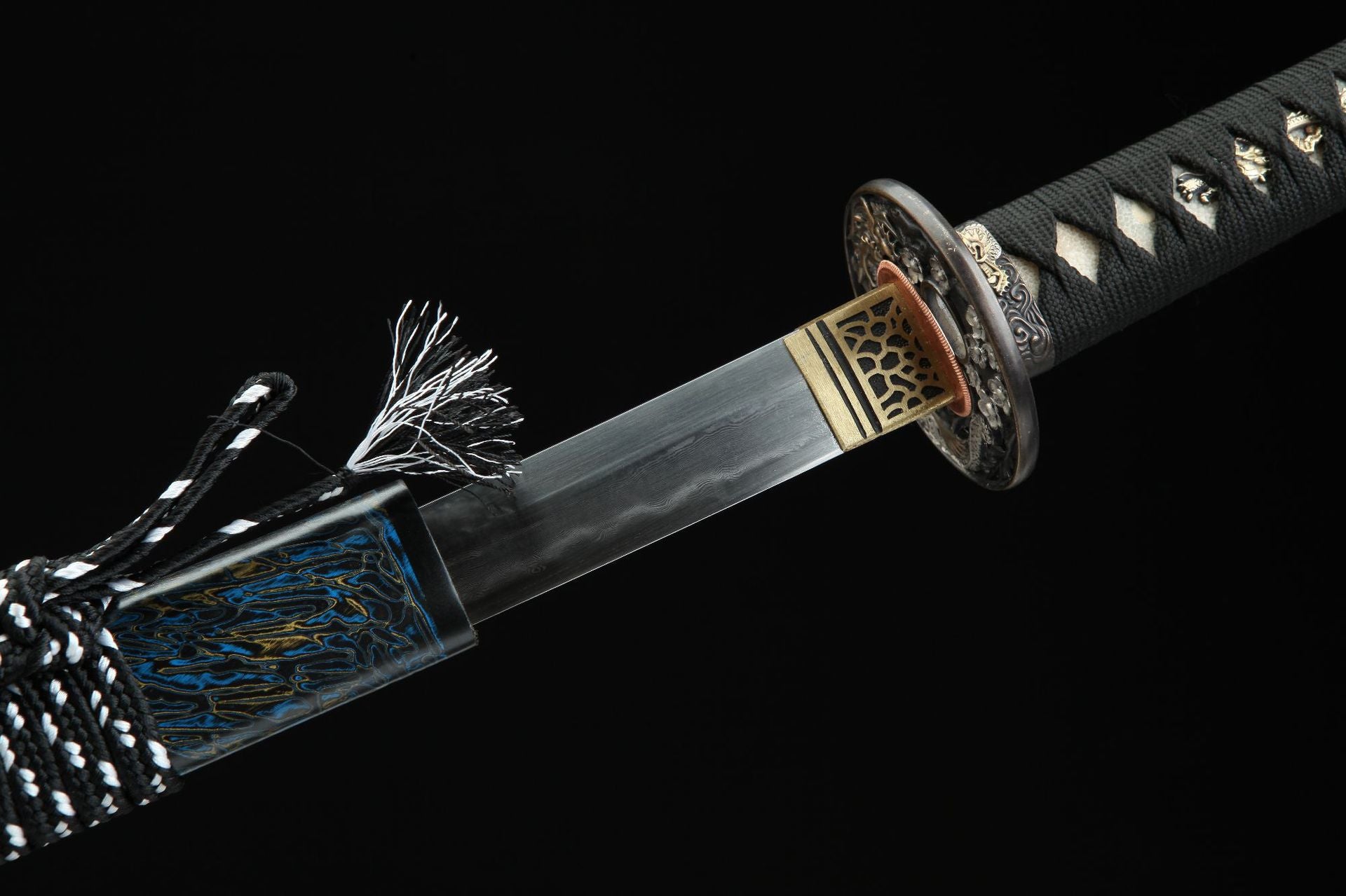 Close-up of Seiryu katana showing the detailed handle wrapping and blade, including the guard and the sword's overall elegant design.