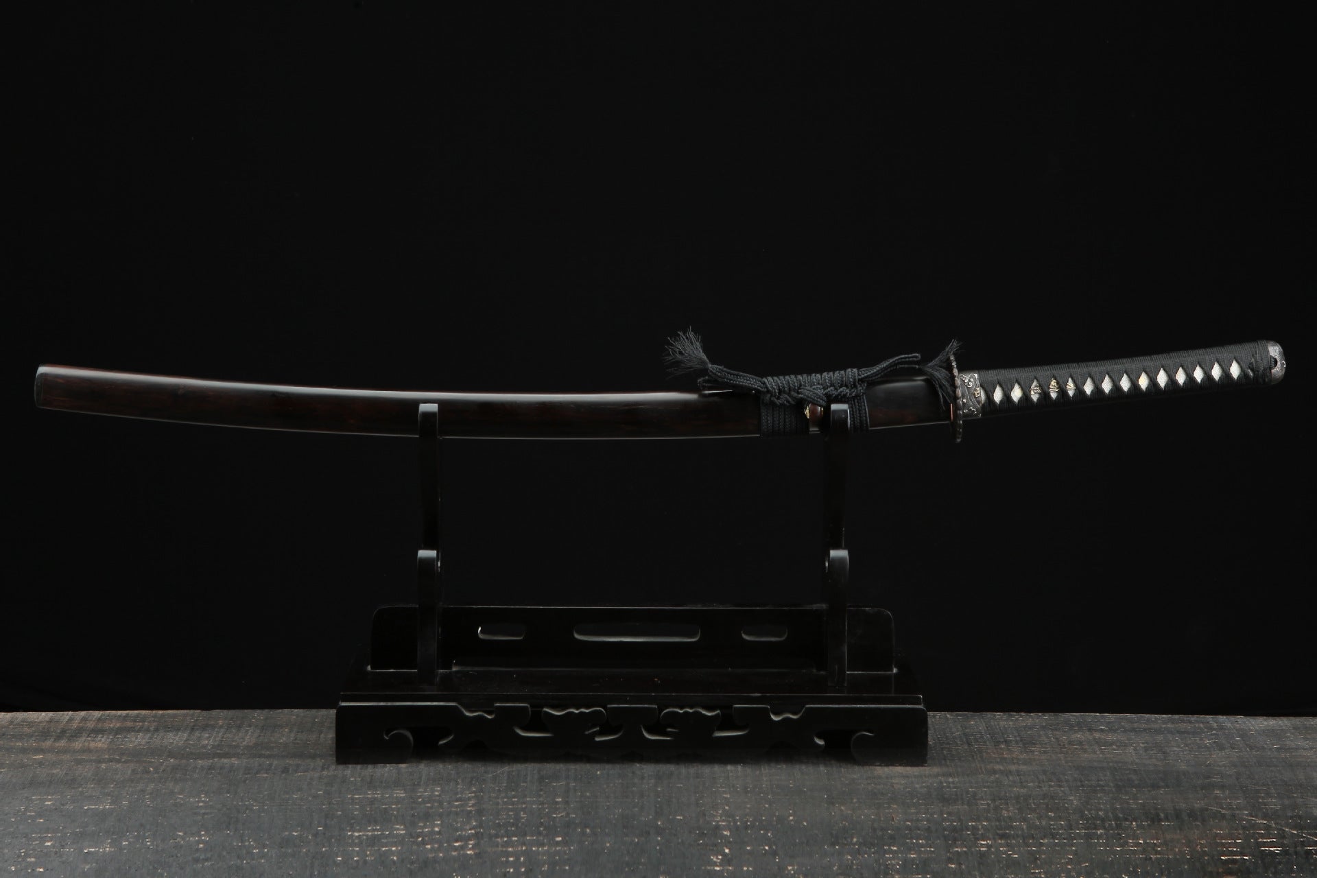 Full koshirae view of the Sunflower Ebony samurai sword with an ebony scabbard