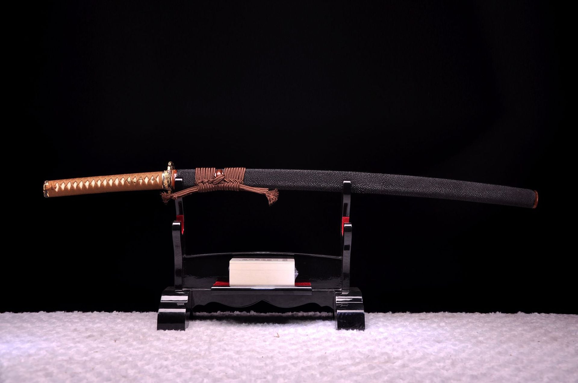 Sword mountings, tsuka with brown ito wrap over genuine ray skin and a fully ray skin covered saya.
