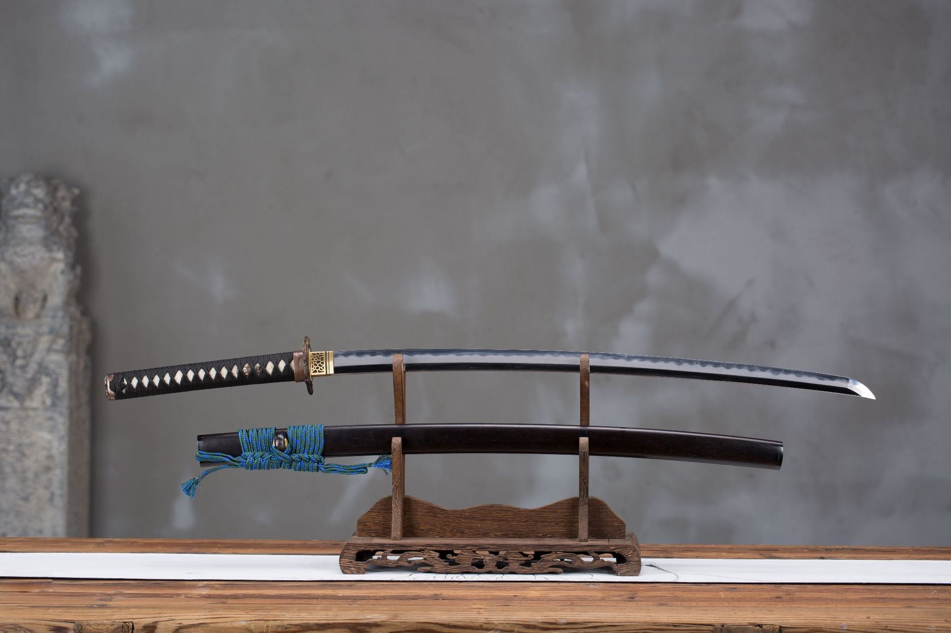Meditation katana displayed with a full blade detailed tsuba and visible tsuka.